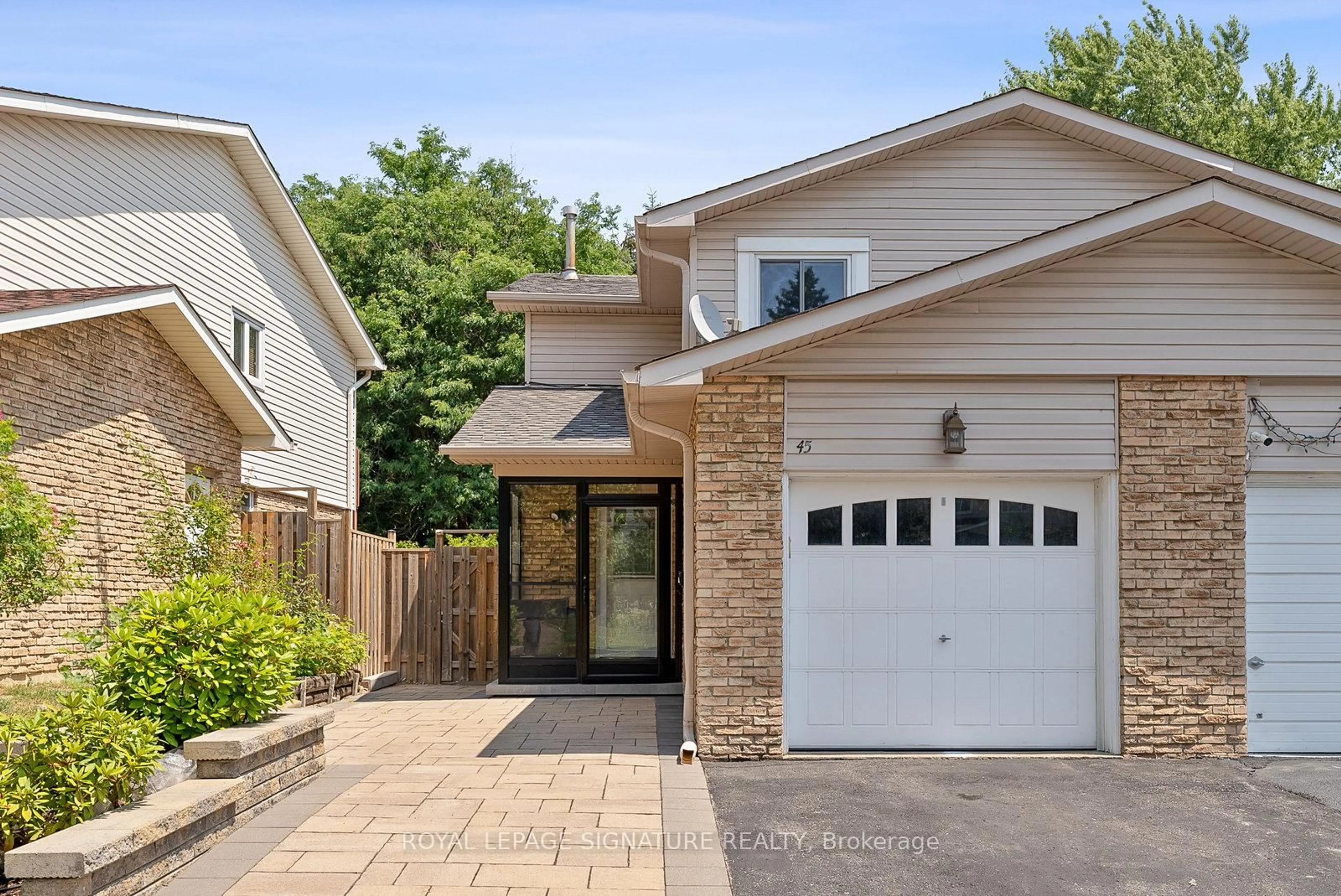 Home with brick exterior material, street for 45 Montezuma Tr, Toronto Ontario M1V 1K4