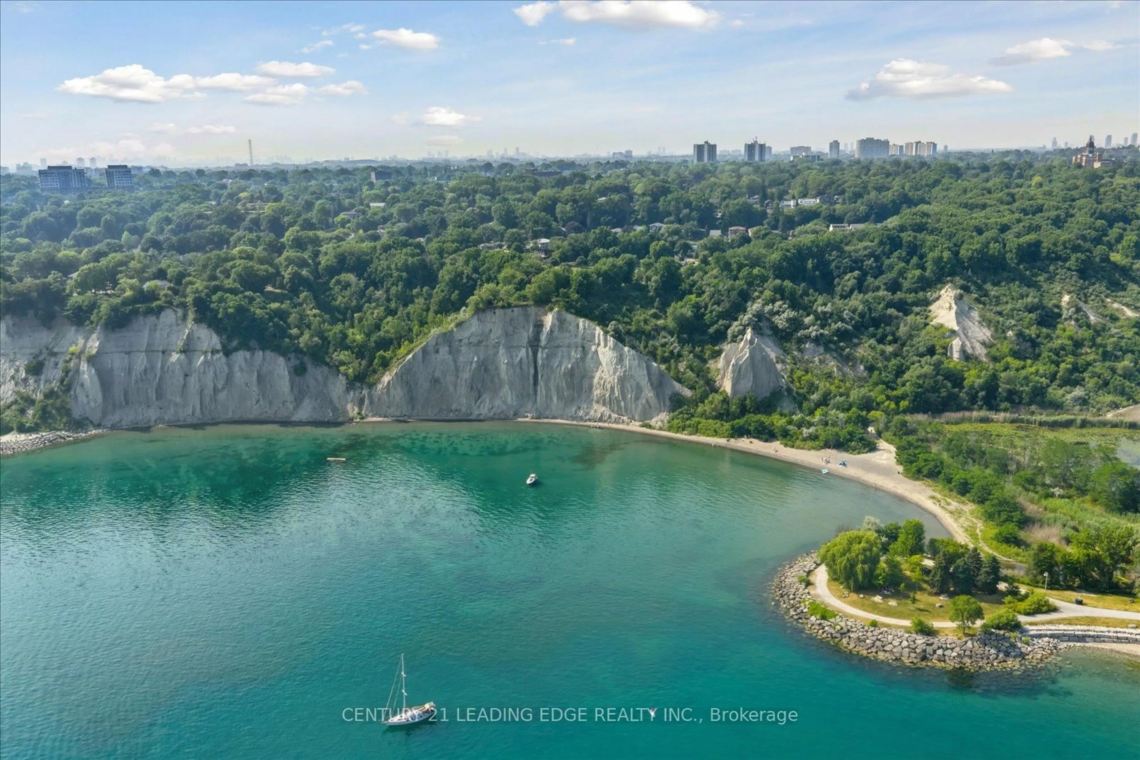 A pic from outside/outdoor area/front of a property/back of a property/a pic from drone, water/lake/river/ocean view for 3 Latham Ave, Toronto Ontario M1N 1M7