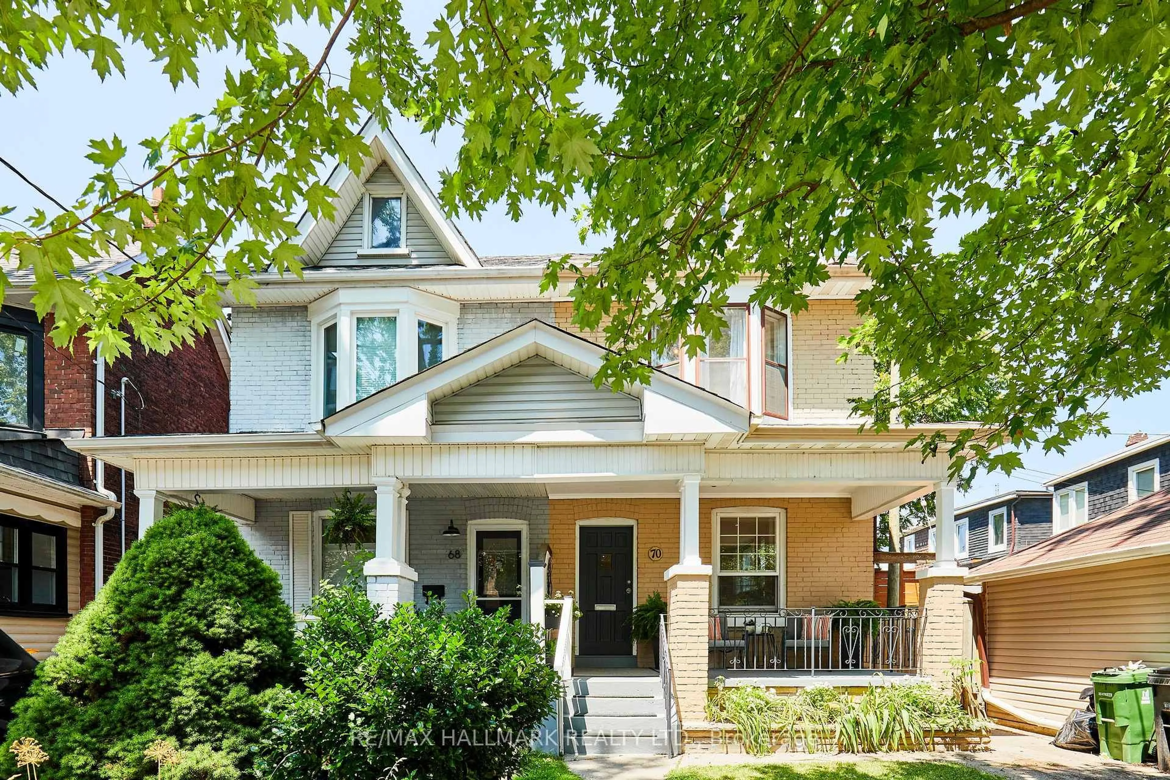 Home with brick exterior material, street for 70 Wolverleigh Blvd, Toronto Ontario M4J 1R7