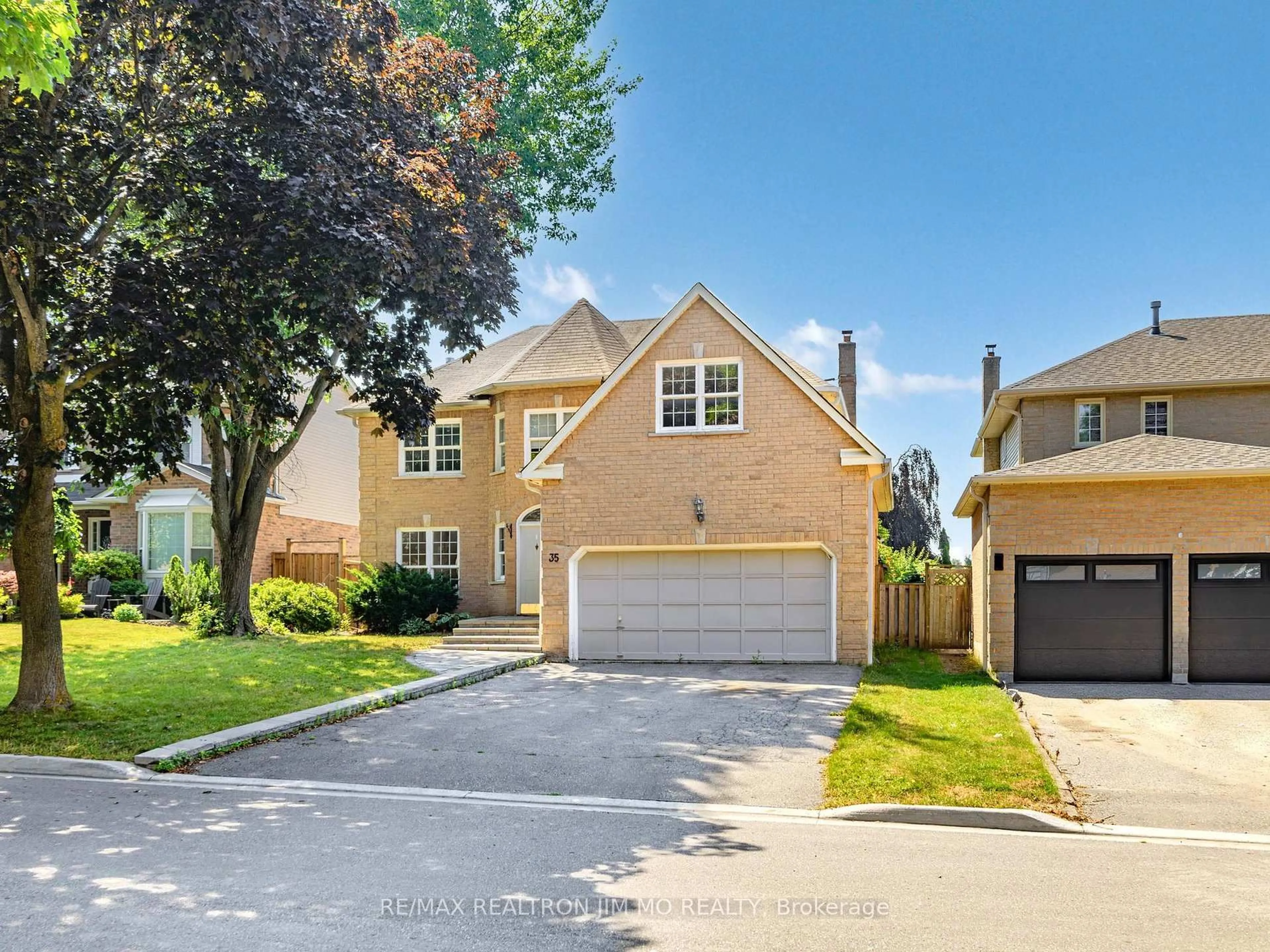 Home with brick exterior material, street for 35 Flint Cres, Whitby Ontario L1R 1K1