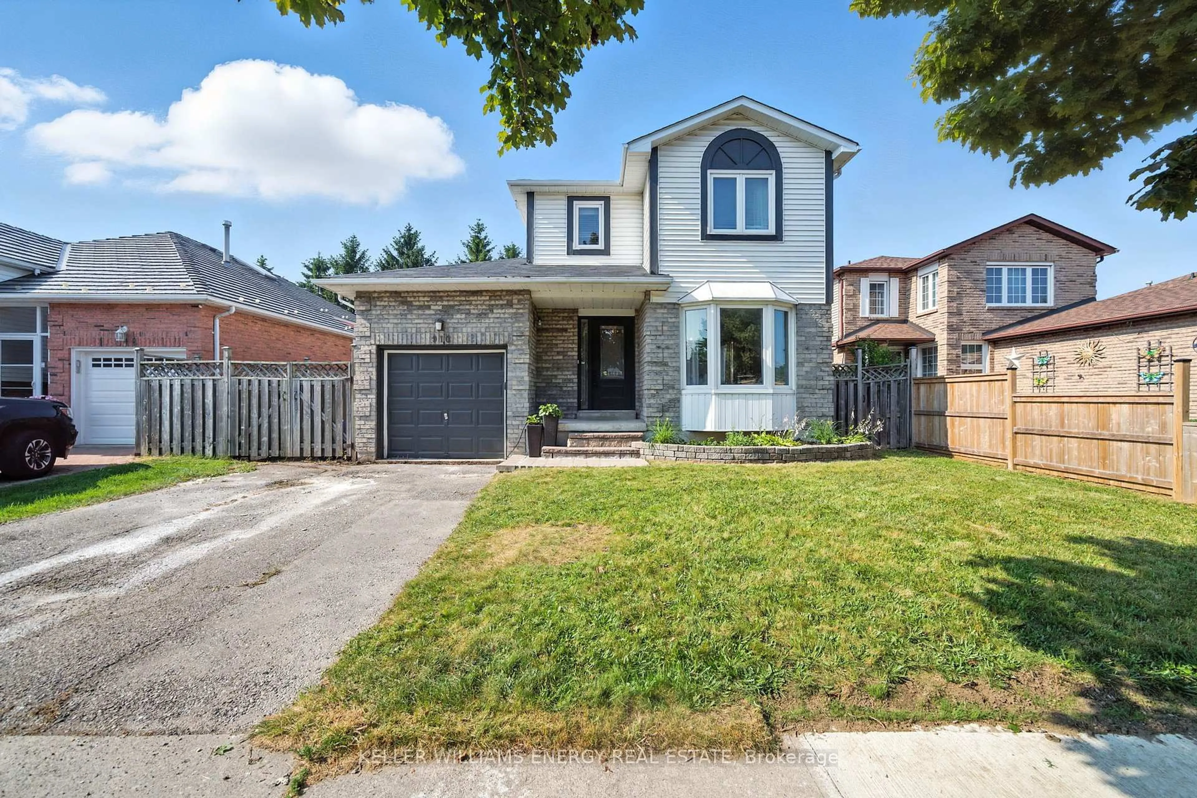 Home with brick exterior material, street for 910 Renaissance Dr, Oshawa Ontario L1J 8K4