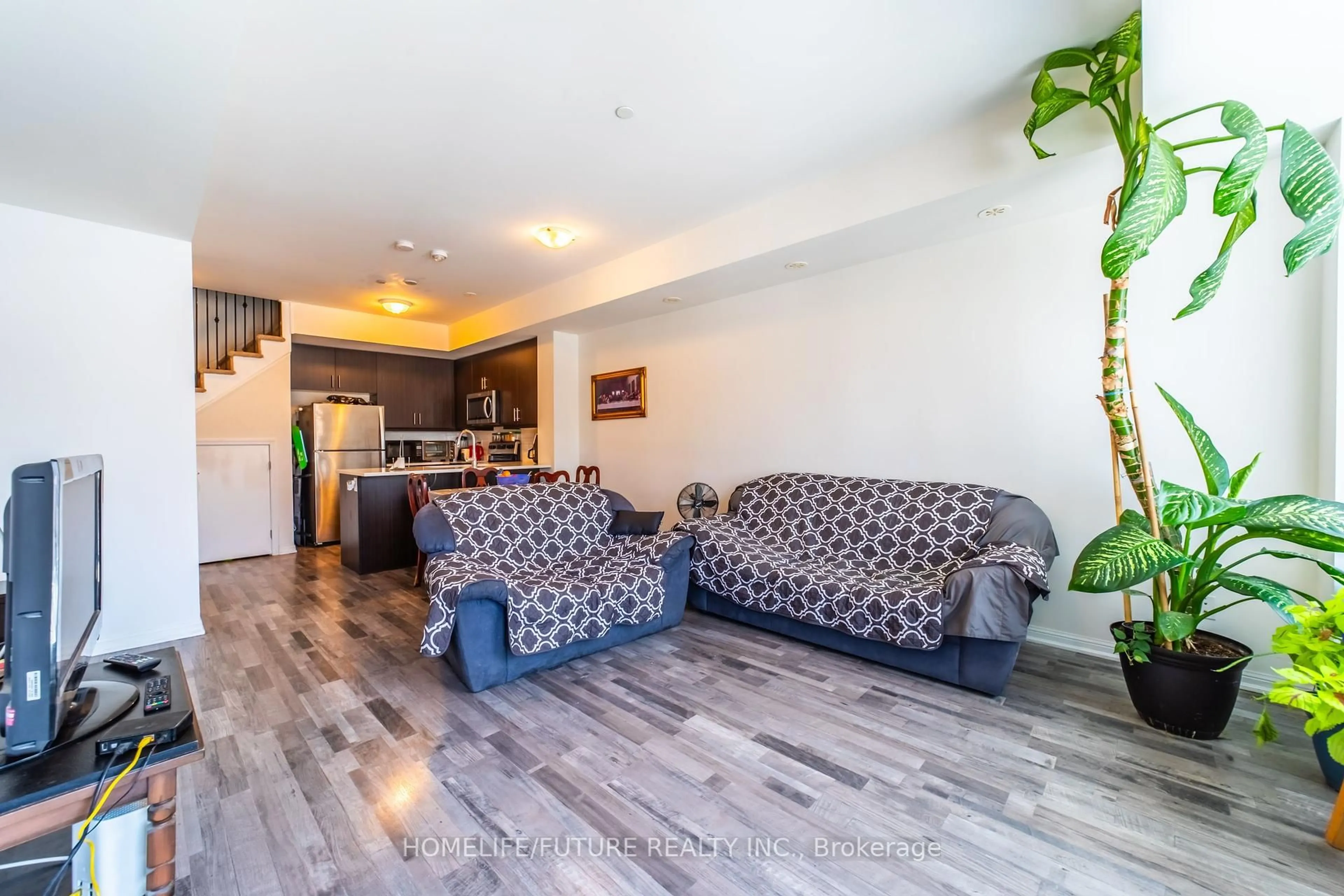 Living room with furniture, unknown for 1460 Whites Rd #413, Pickering Ontario L1V 0E8