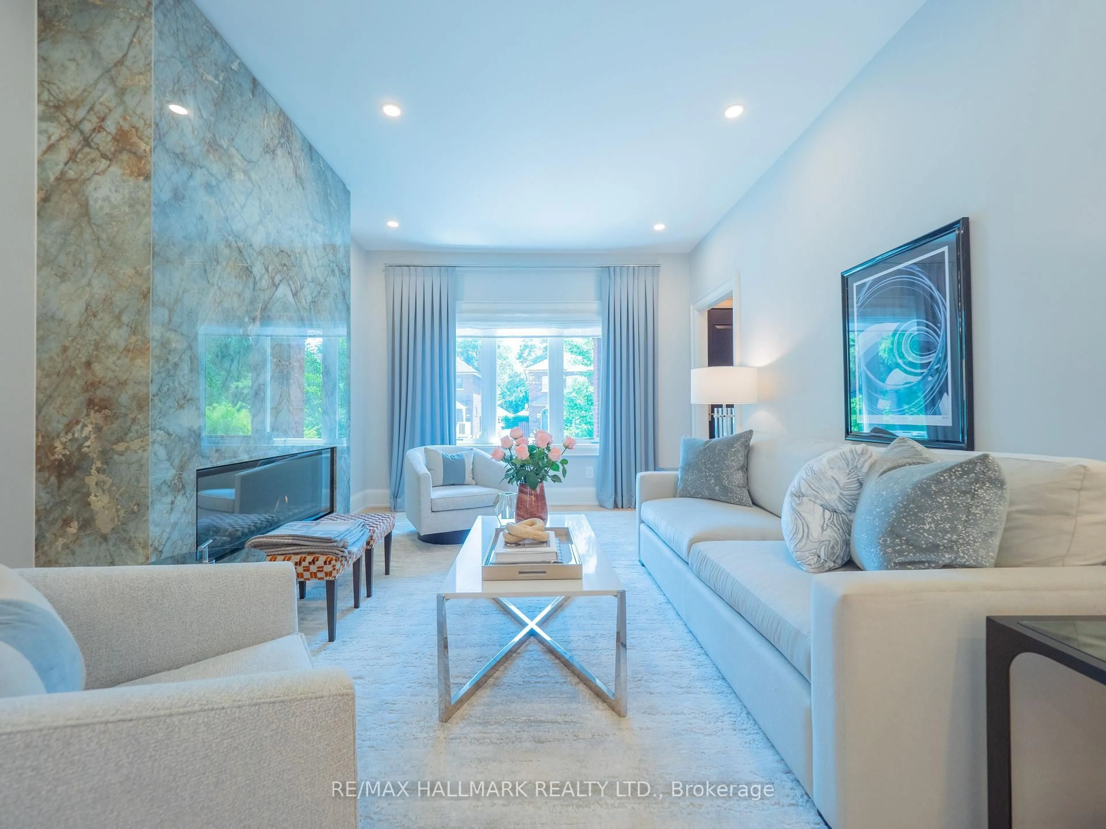 Living room with furniture, ceramic/tile floor for 60 Nealon Ave, Toronto Ontario M4K 1Z2