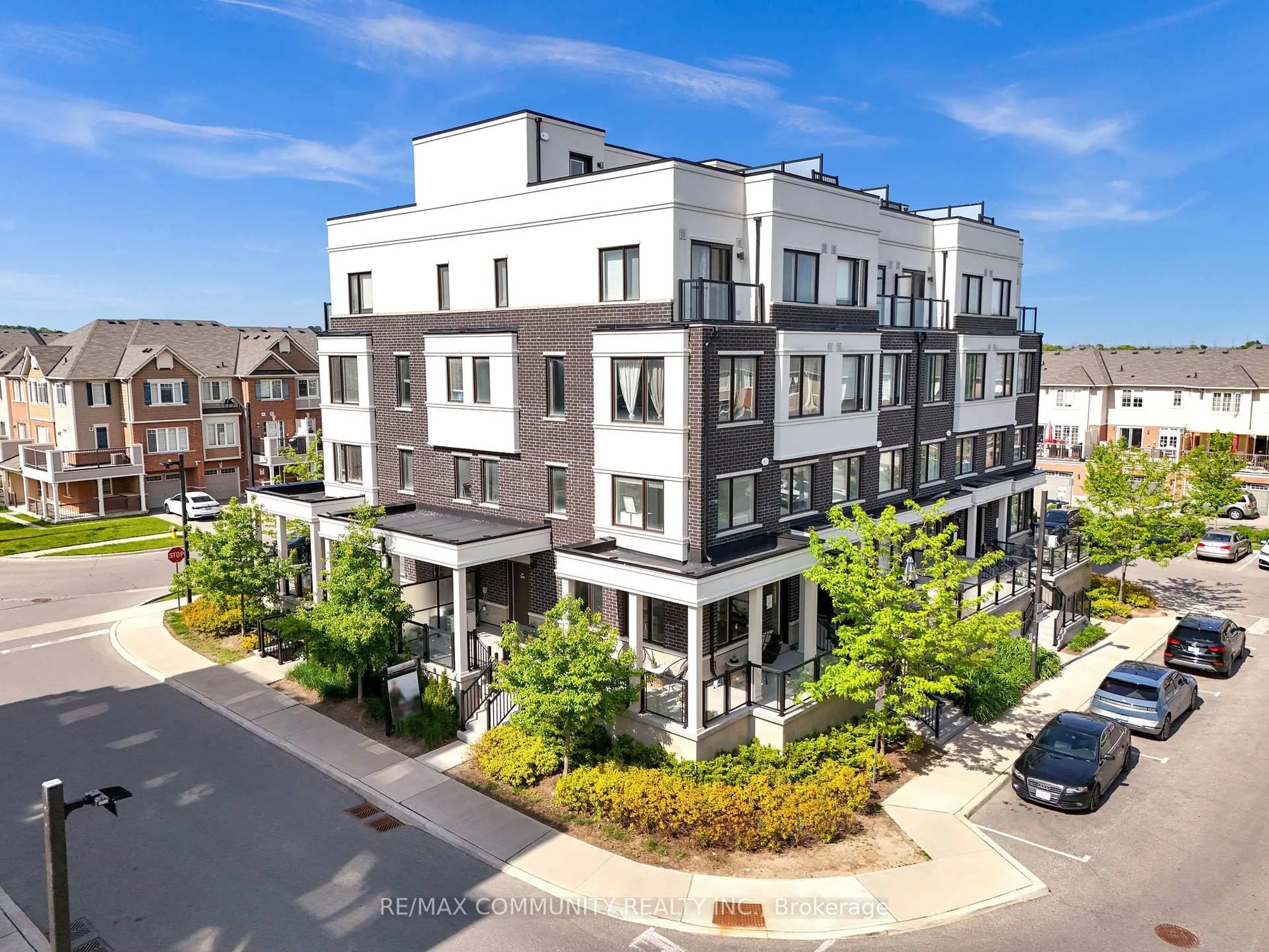 A pic from outside/outdoor area/front of a property/back of a property/a pic from drone, unknown for 1711 Pure Springs Blvd #308, Pickering Ontario L1X 0E3