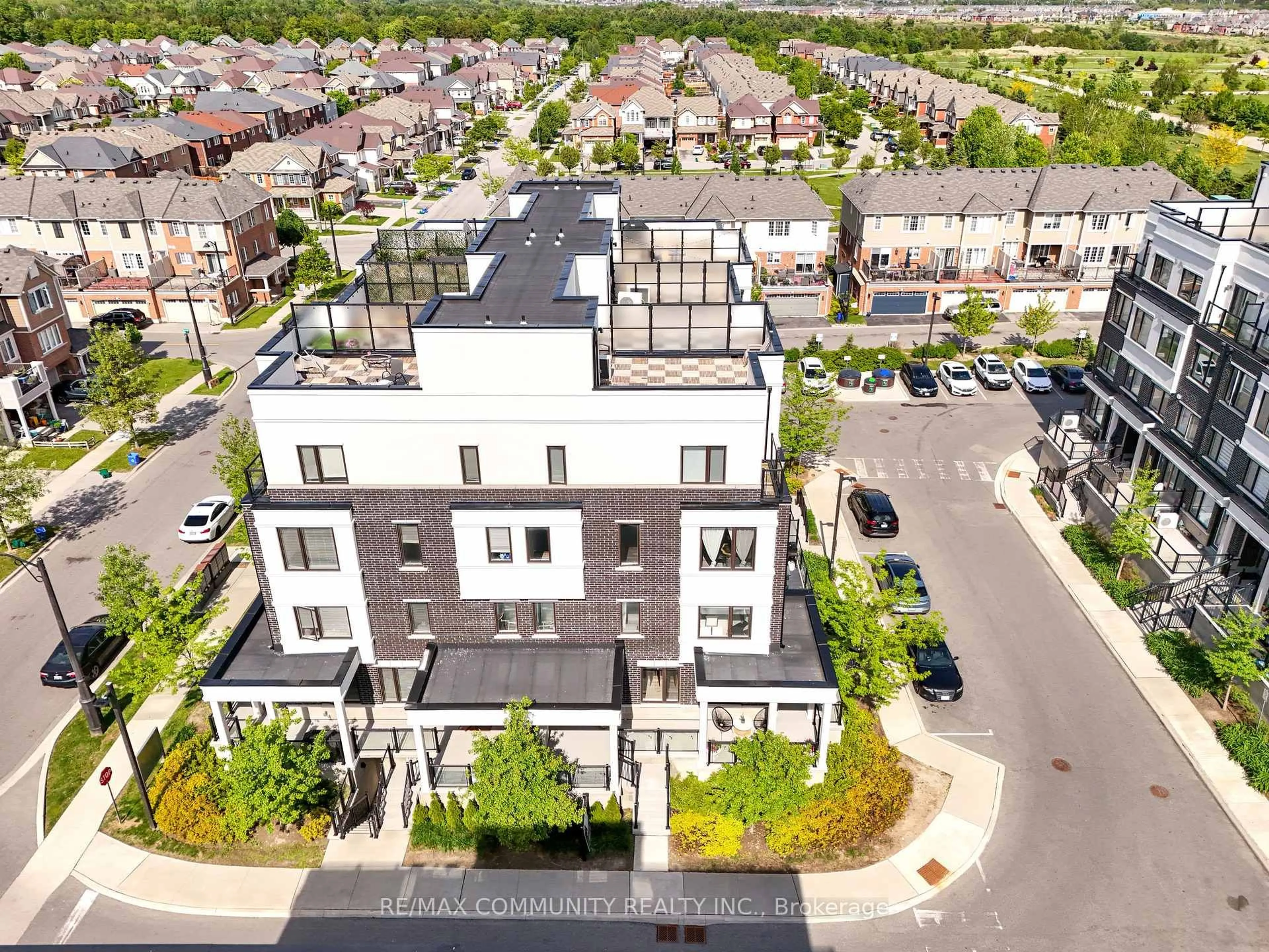 A pic from outside/outdoor area/front of a property/back of a property/a pic from drone, street for 1711 Pure Springs Blvd #308, Pickering Ontario L1X 0E3