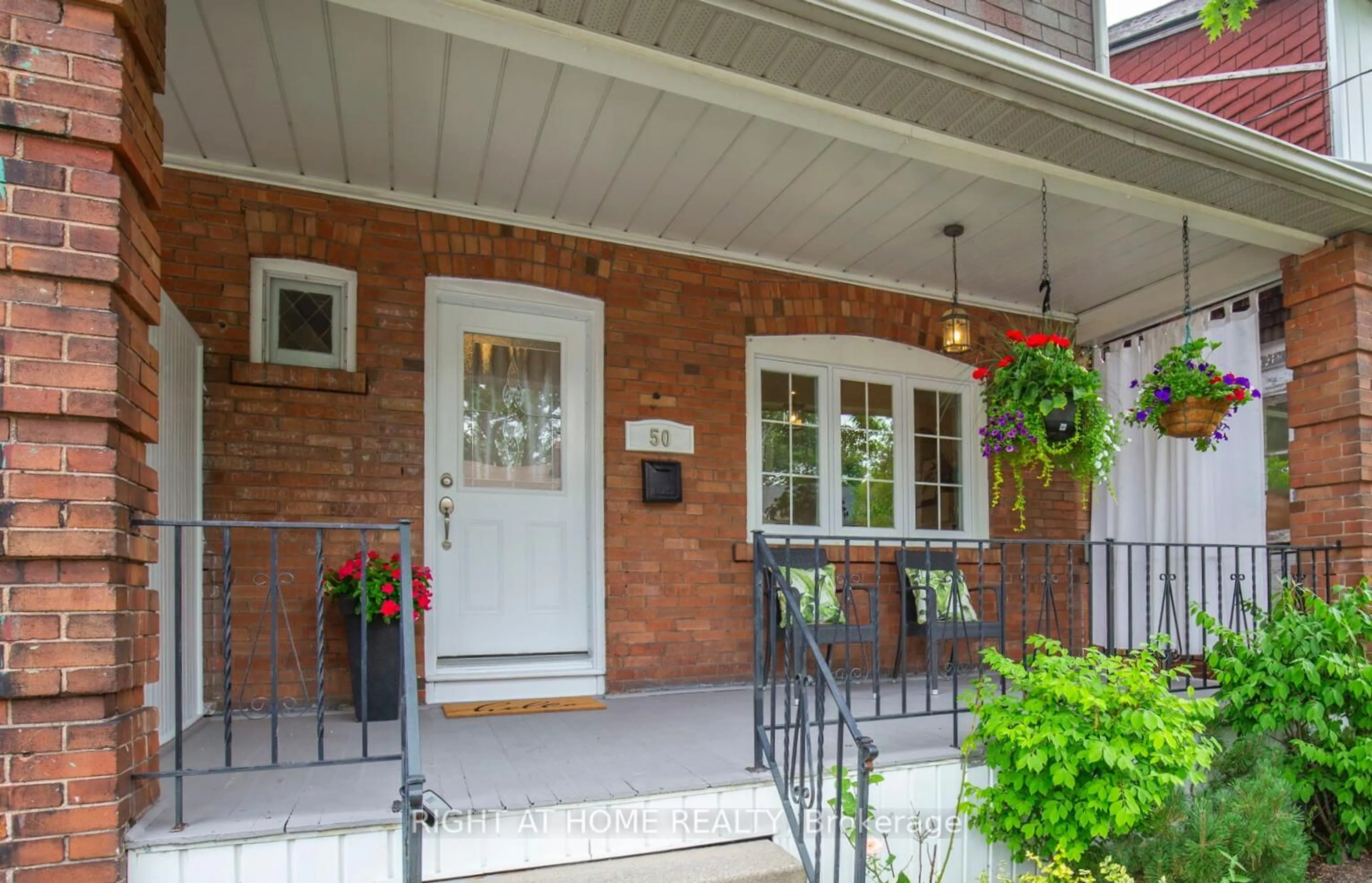 Home with brick exterior material, street for 50 Iona Ave, Toronto Ontario M4C 5J4