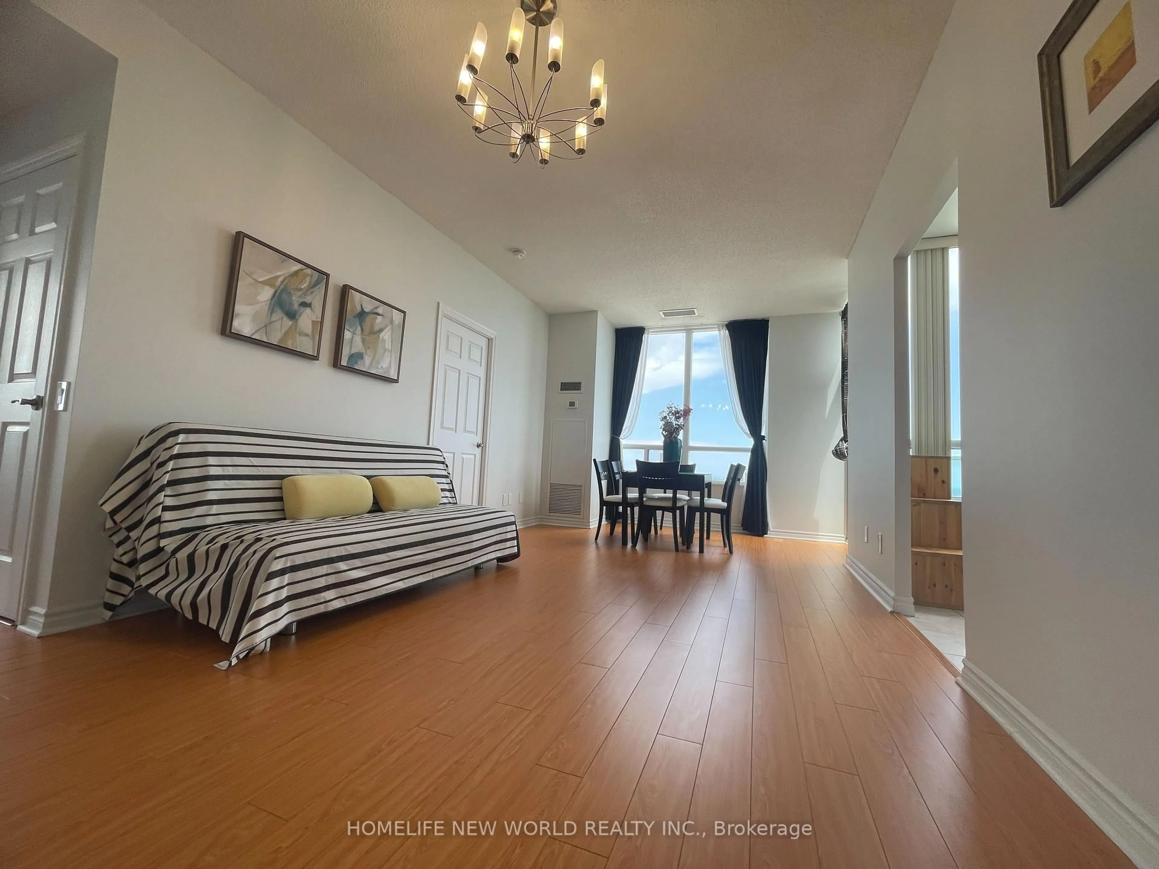 Living room with furniture, wood/laminate floor for 61 Town Centre Crt #Ph9, Toronto Ontario M1P 5C5