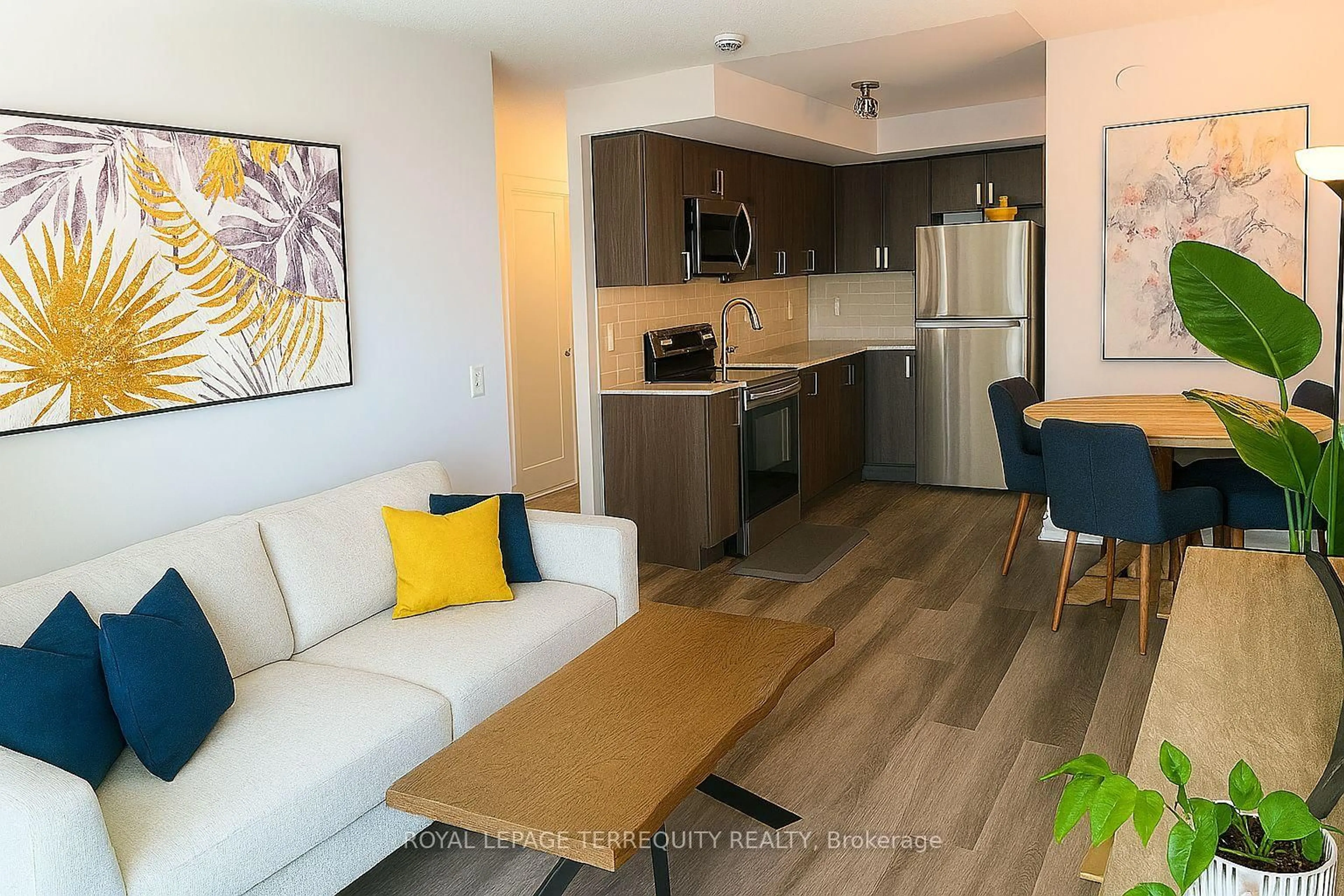 Living room with furniture, wood/laminate floor for 1435 Celebration Dr #1106, Pickering Ontario L1W 0C4