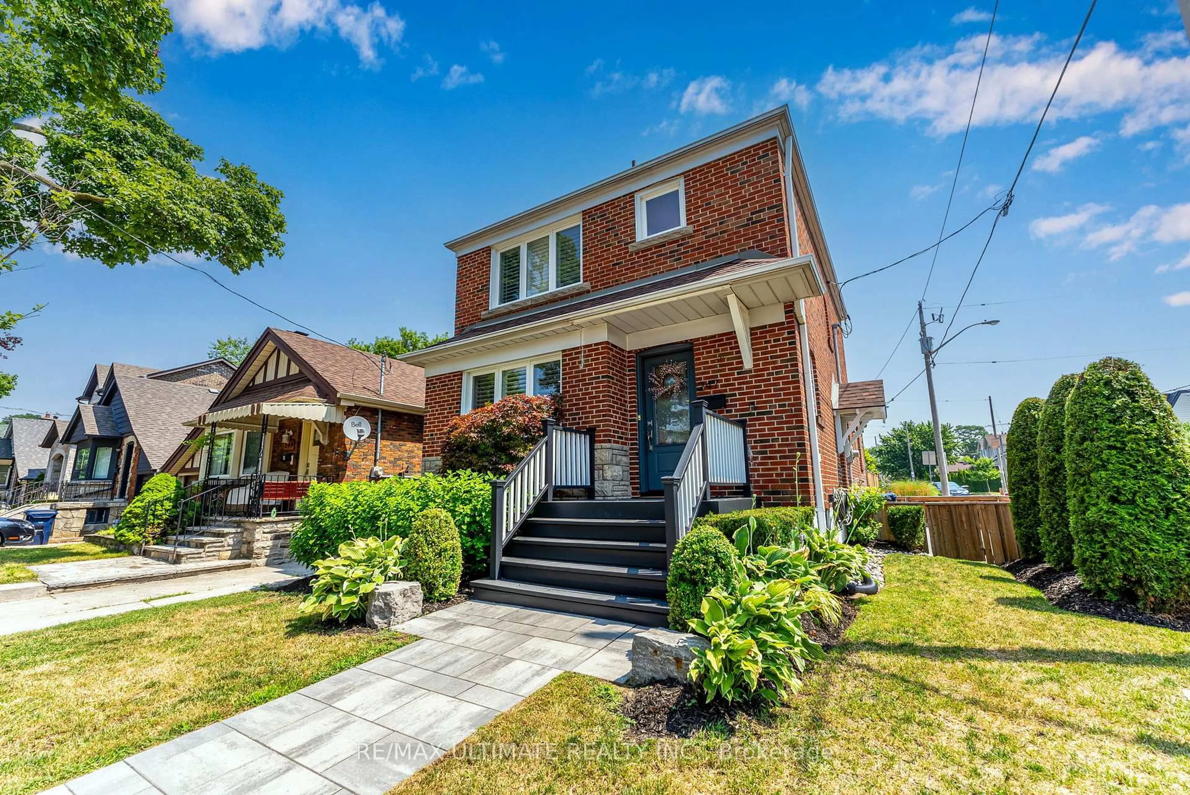 Home with brick exterior material, street for 247 Dewhurst Blvd, Toronto Ontario M4J 3K7
