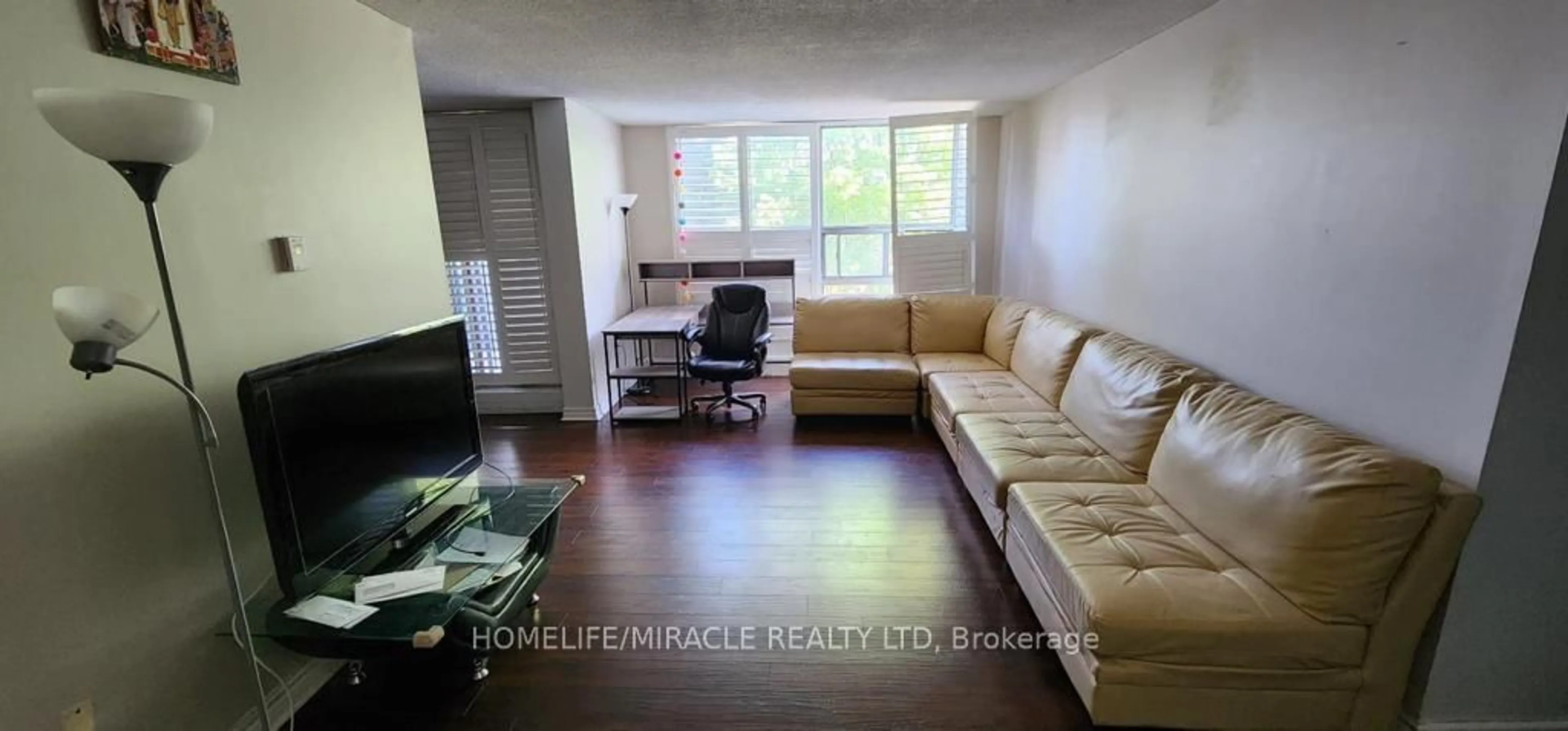 Living room with furniture, unknown for 1701 Mccowan Rd #207, Toronto Ontario M1S 2Y3