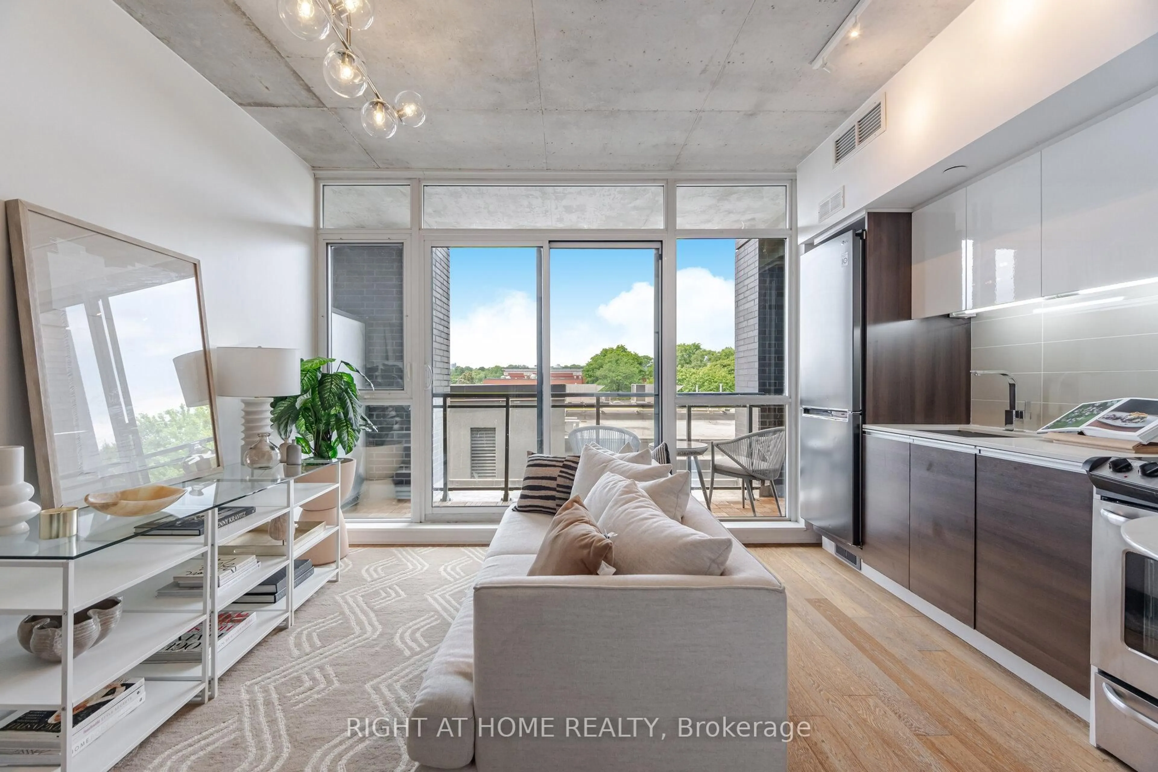 Living room with furniture, unknown for 1190 Dundas St #527, Toronto Ontario M4M 0C5