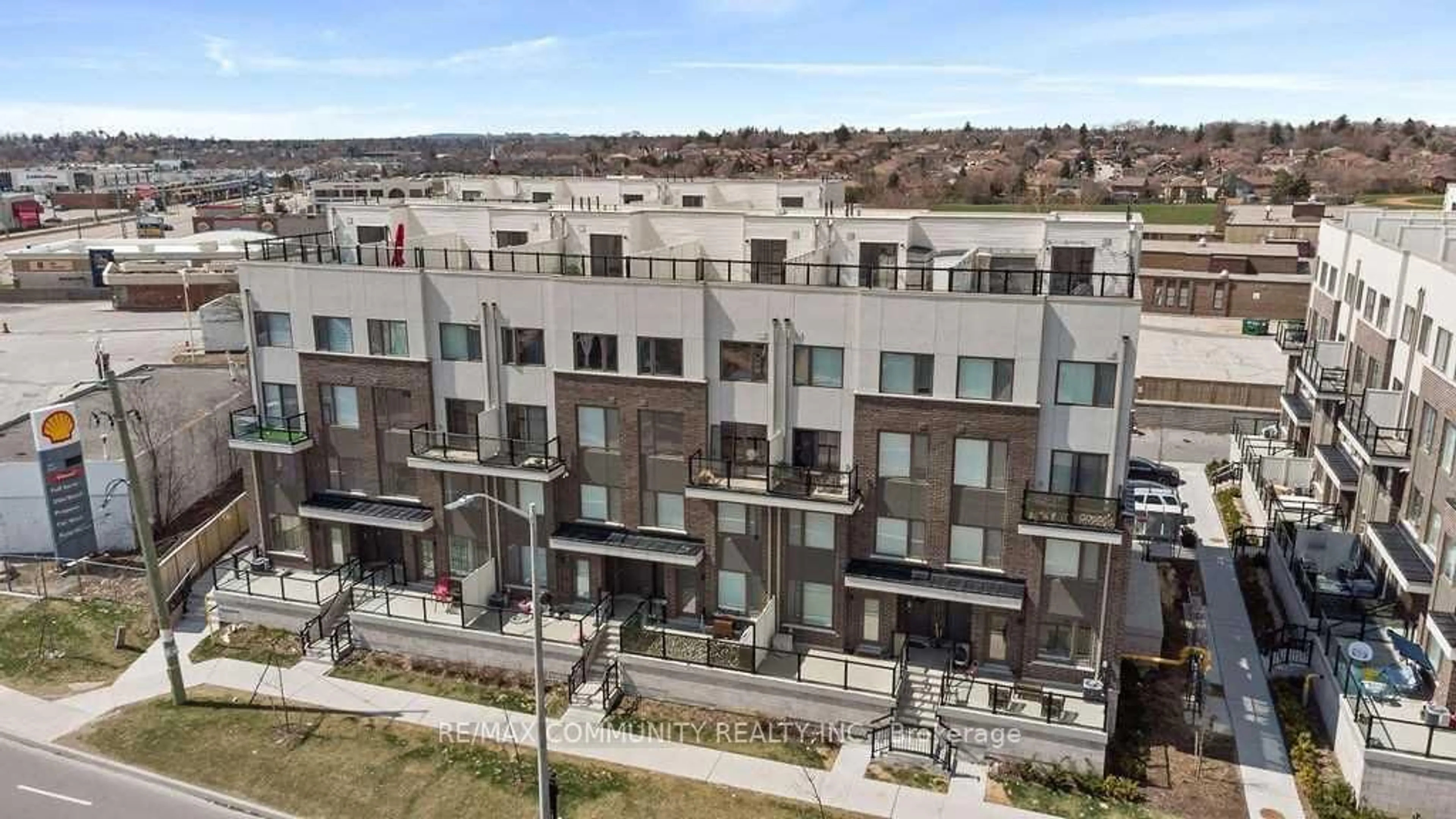 A pic from outside/outdoor area/front of a property/back of a property/a pic from drone, city buildings view from balcony for 1460 Whites Rd #306, Pickering Ontario L1V 1R4