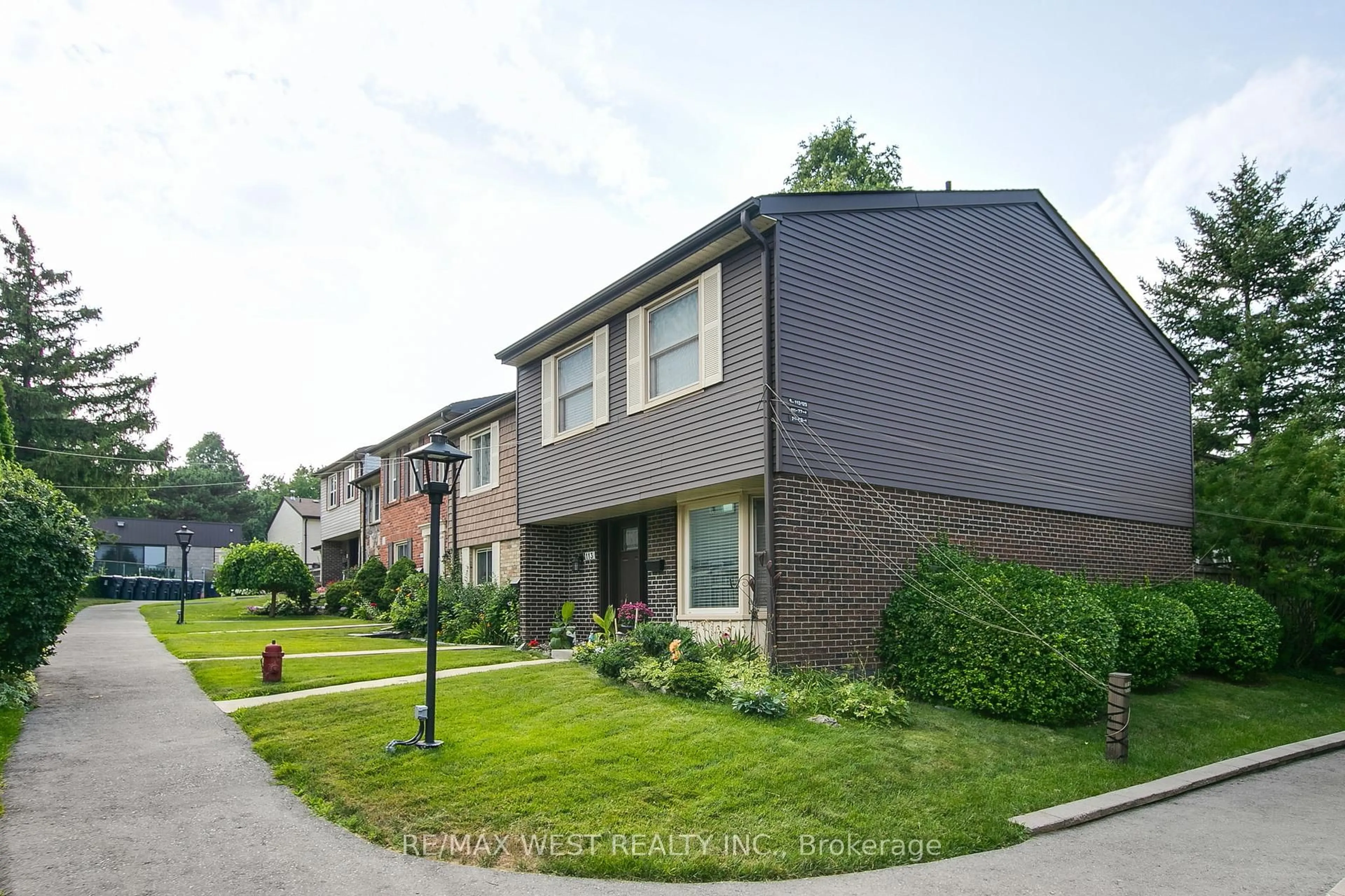 Home with brick exterior material, street for 113 Palmdale Dr #61, Toronto Ontario M1T 1P2