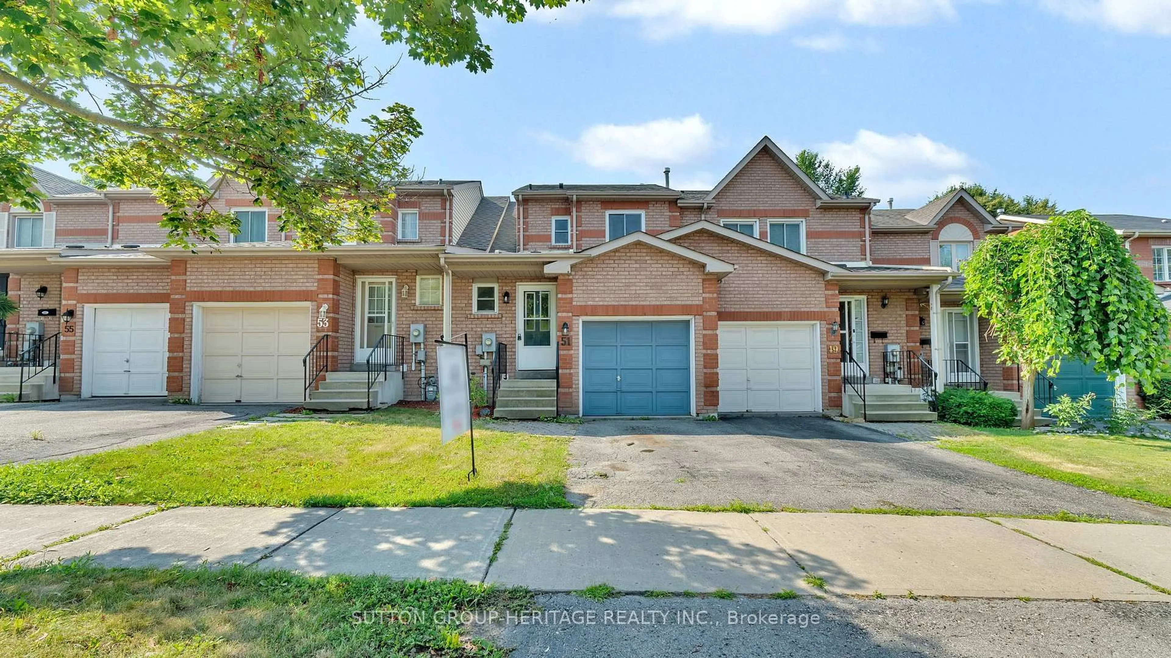 Home with brick exterior material, street for 51 Wallace Dr, Whitby Ontario L1N 9B7
