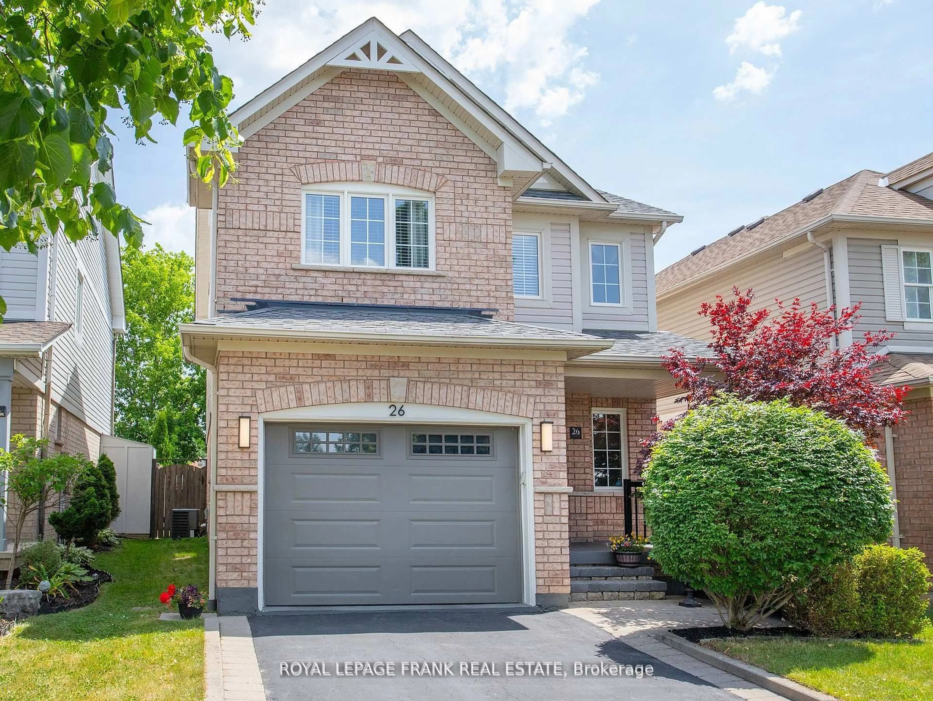 Home with brick exterior material, street for 26 Juneau Cres, Whitby Ontario L1R 3A3