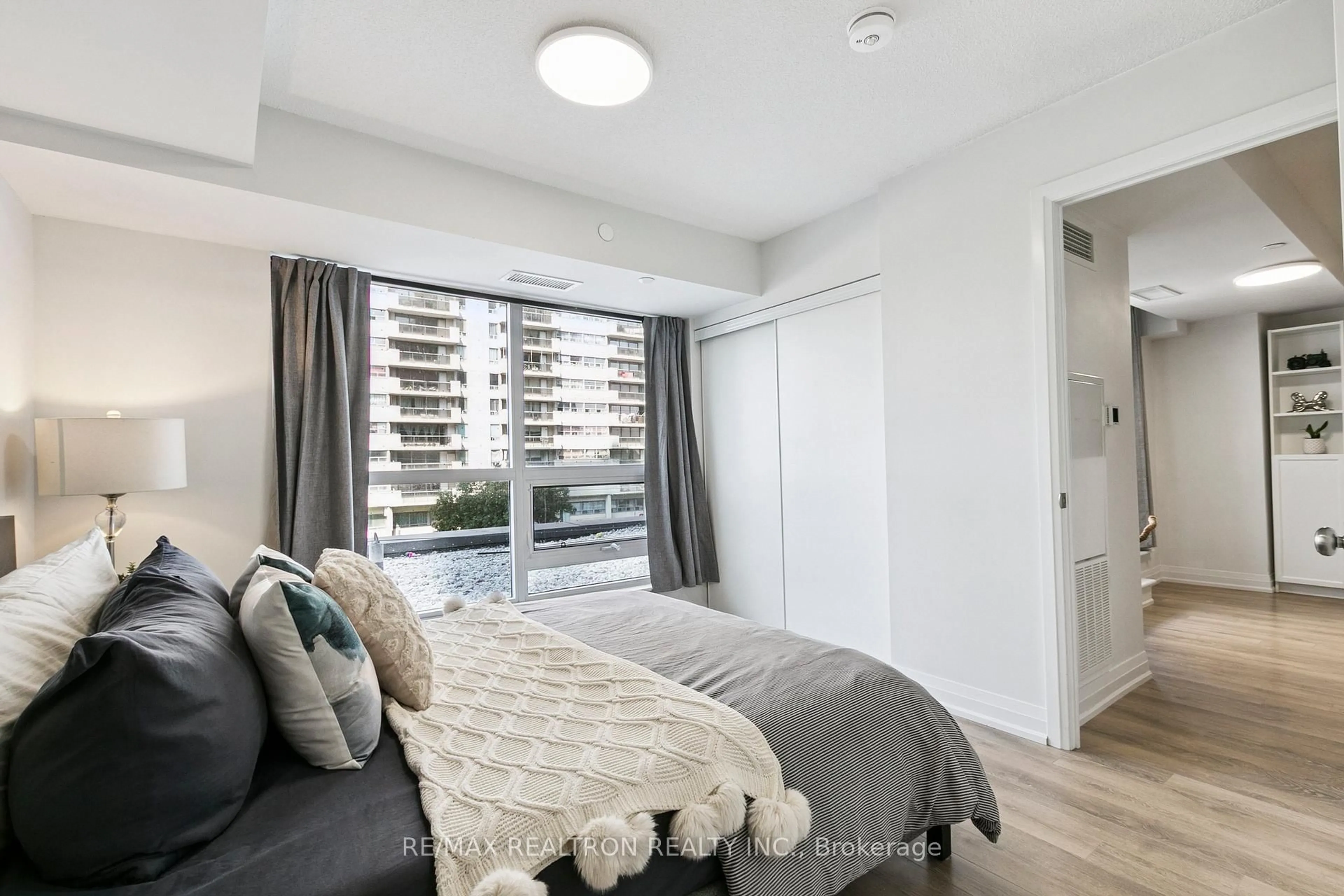 Bedroom with bed, unknown for 20 Meadowglen Pl #232, Toronto Ontario M1G 0A9