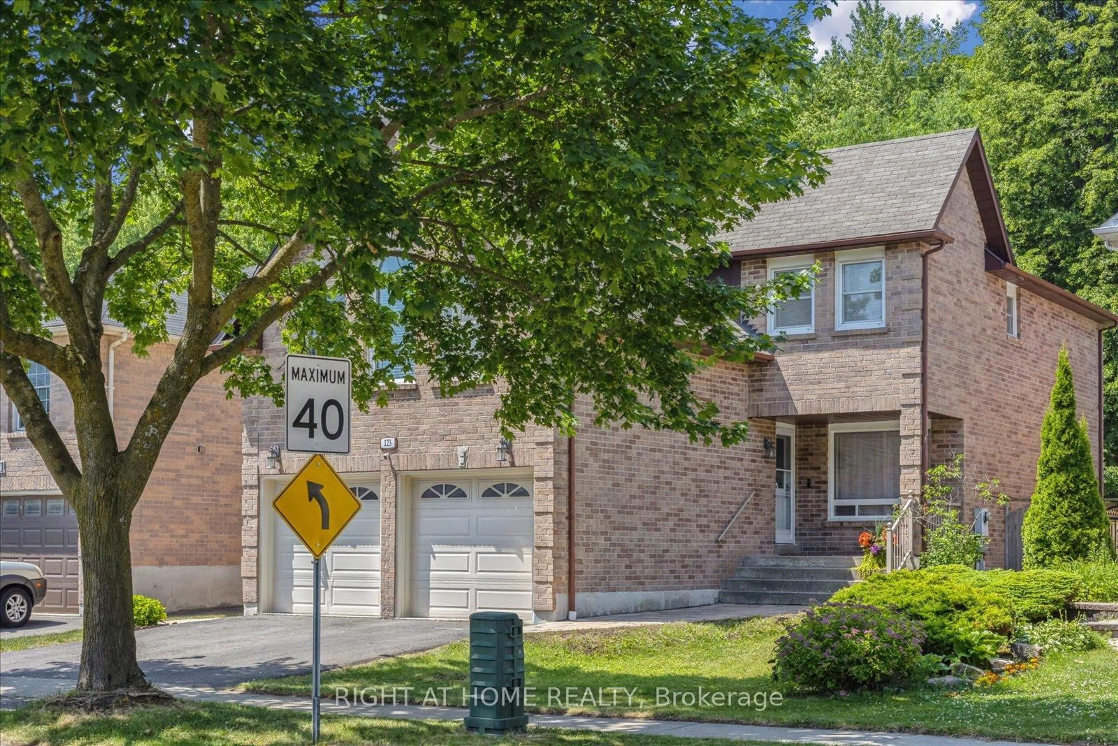 Home with brick exterior material, street for 123 Ravenscroft Rd, Ajax Ontario L1T 1X3