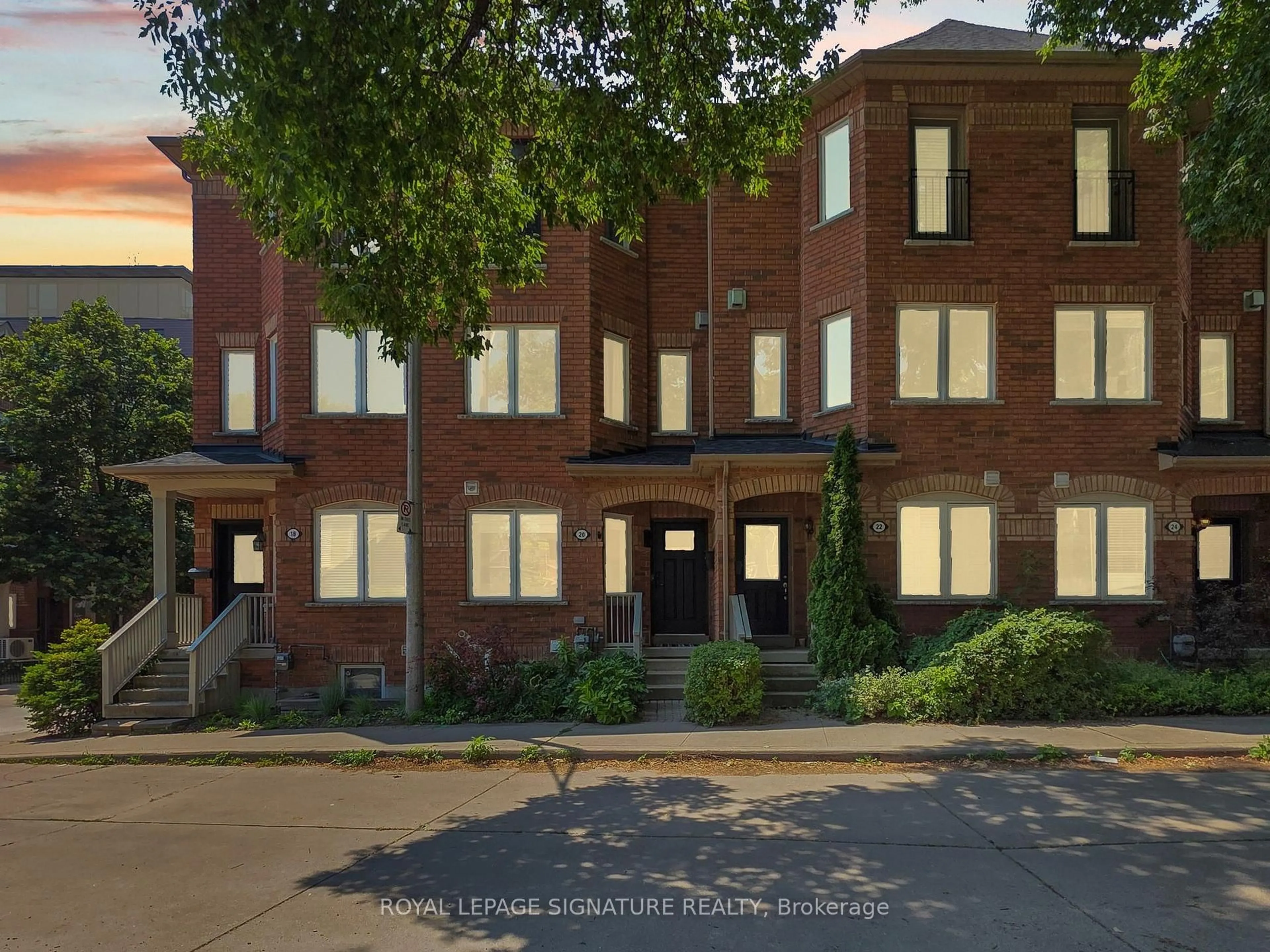 Home with brick exterior material, street for 20 Filmic Lane, Toronto Ontario M4M 3R1