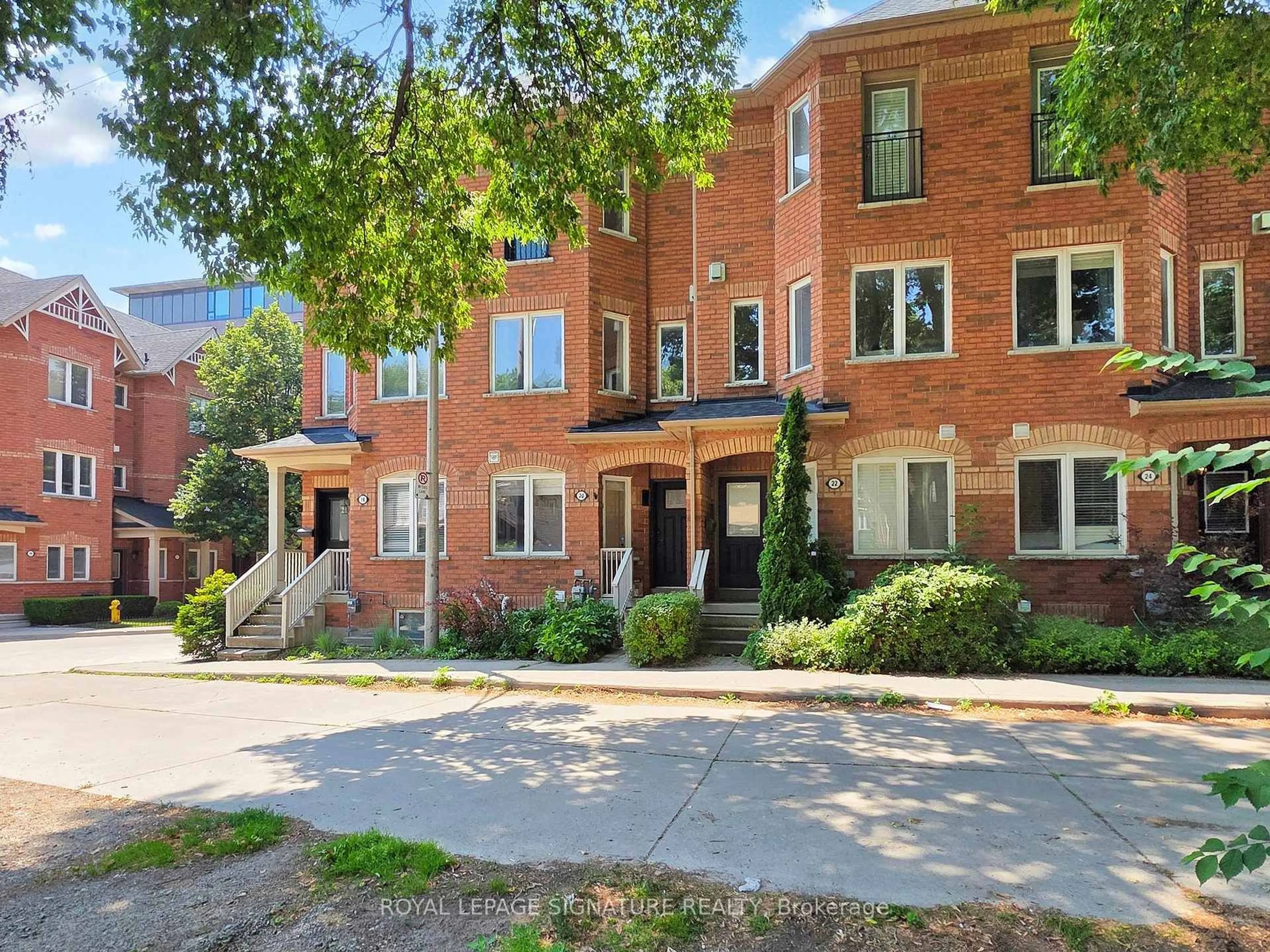 Home with brick exterior material, street for 20 Filmic Lane, Toronto Ontario M4M 3R1