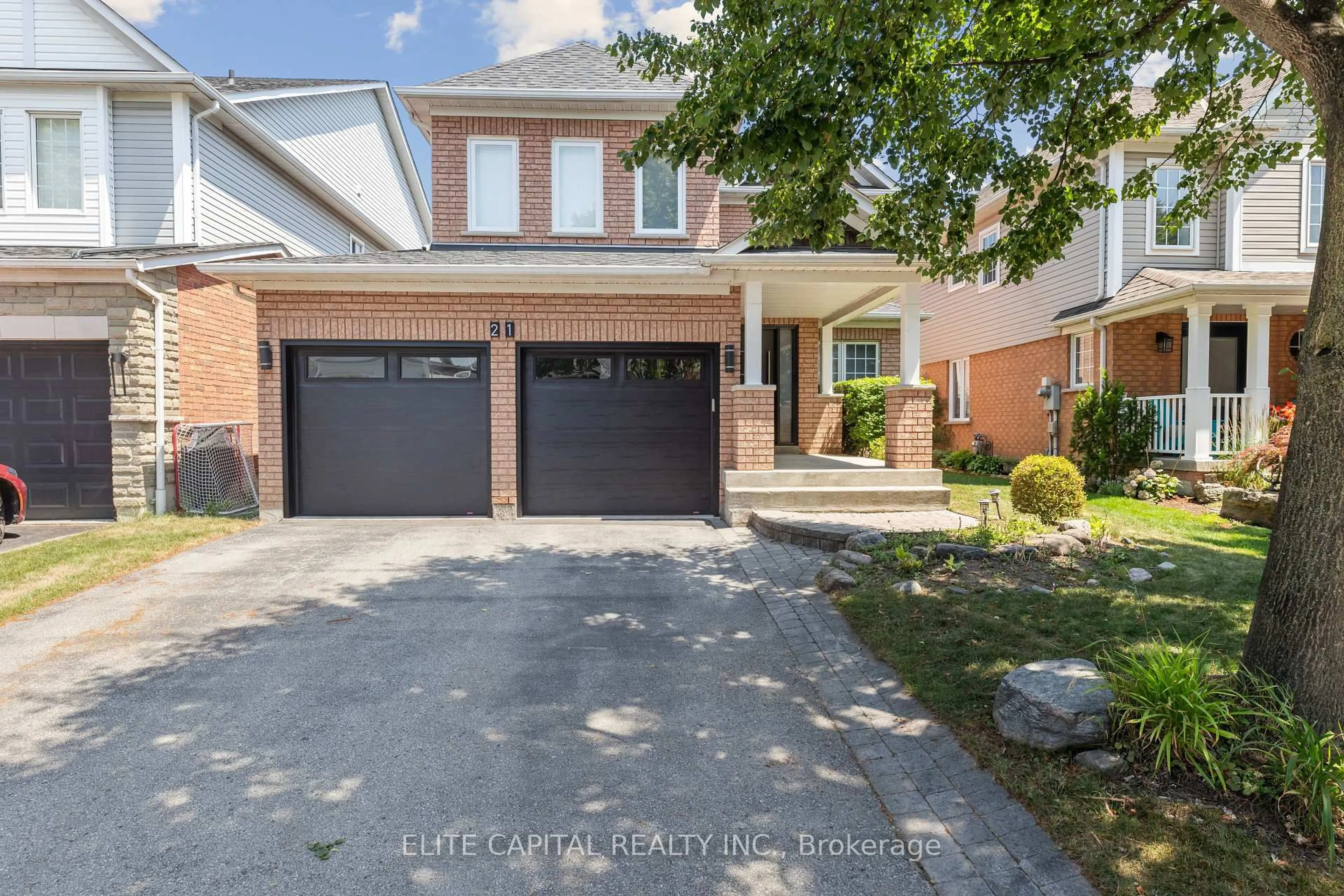 Home with brick exterior material, street for 21 Wiseman Dr, Ajax Ontario L1Z 1K9