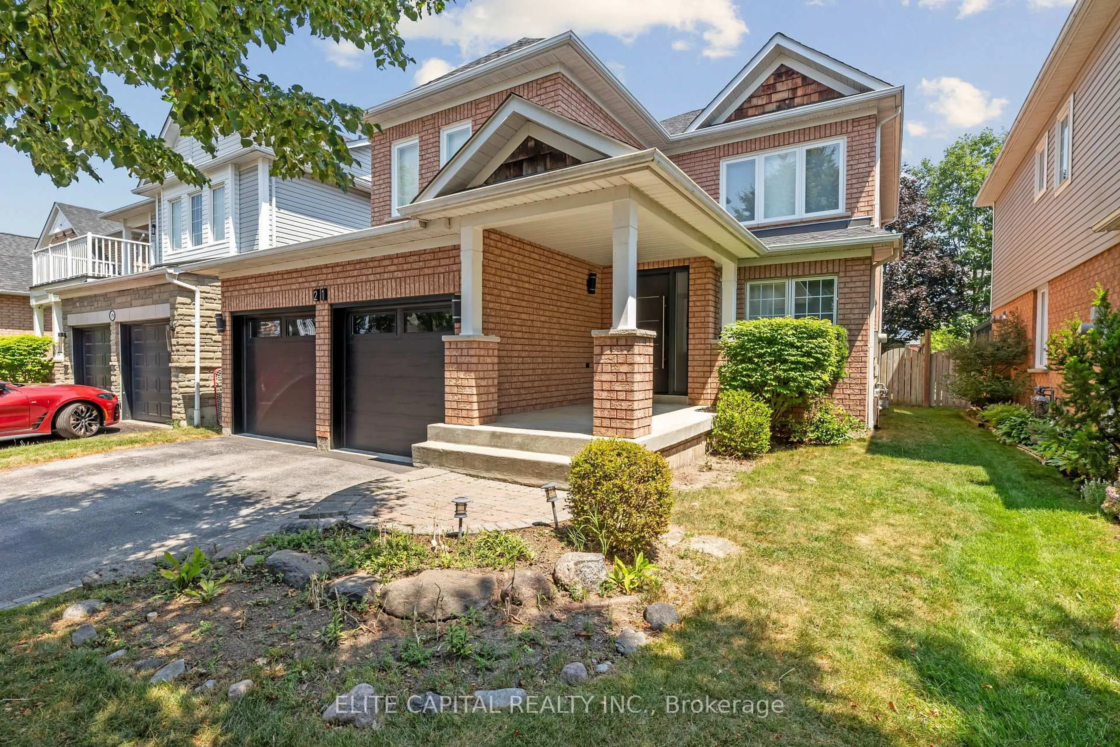 Home with brick exterior material, street for 21 Wiseman Dr, Ajax Ontario L1Z 1K9