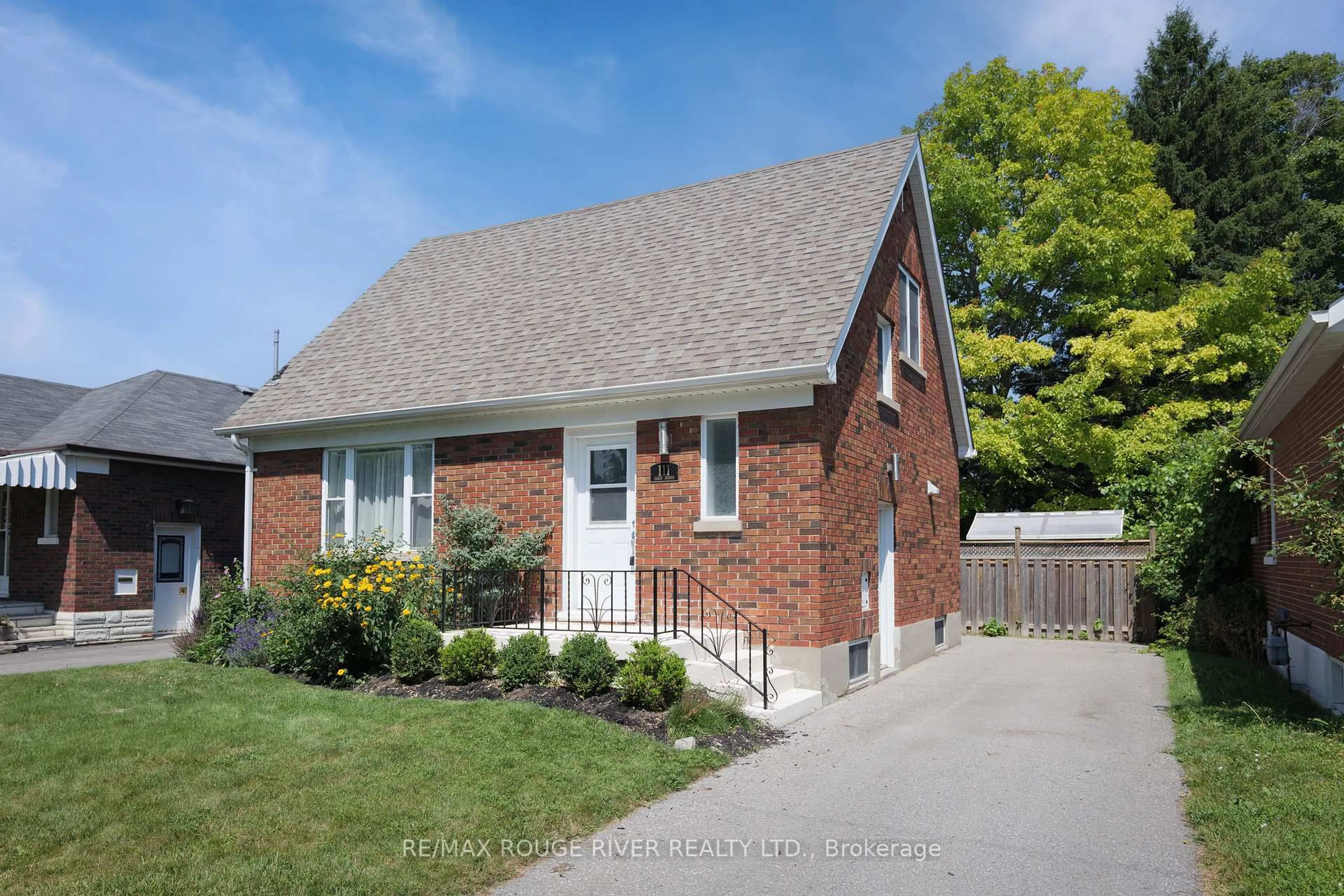 Home with brick exterior material, street for 111 Oakes Ave, Oshawa Ontario L1G 6C5
