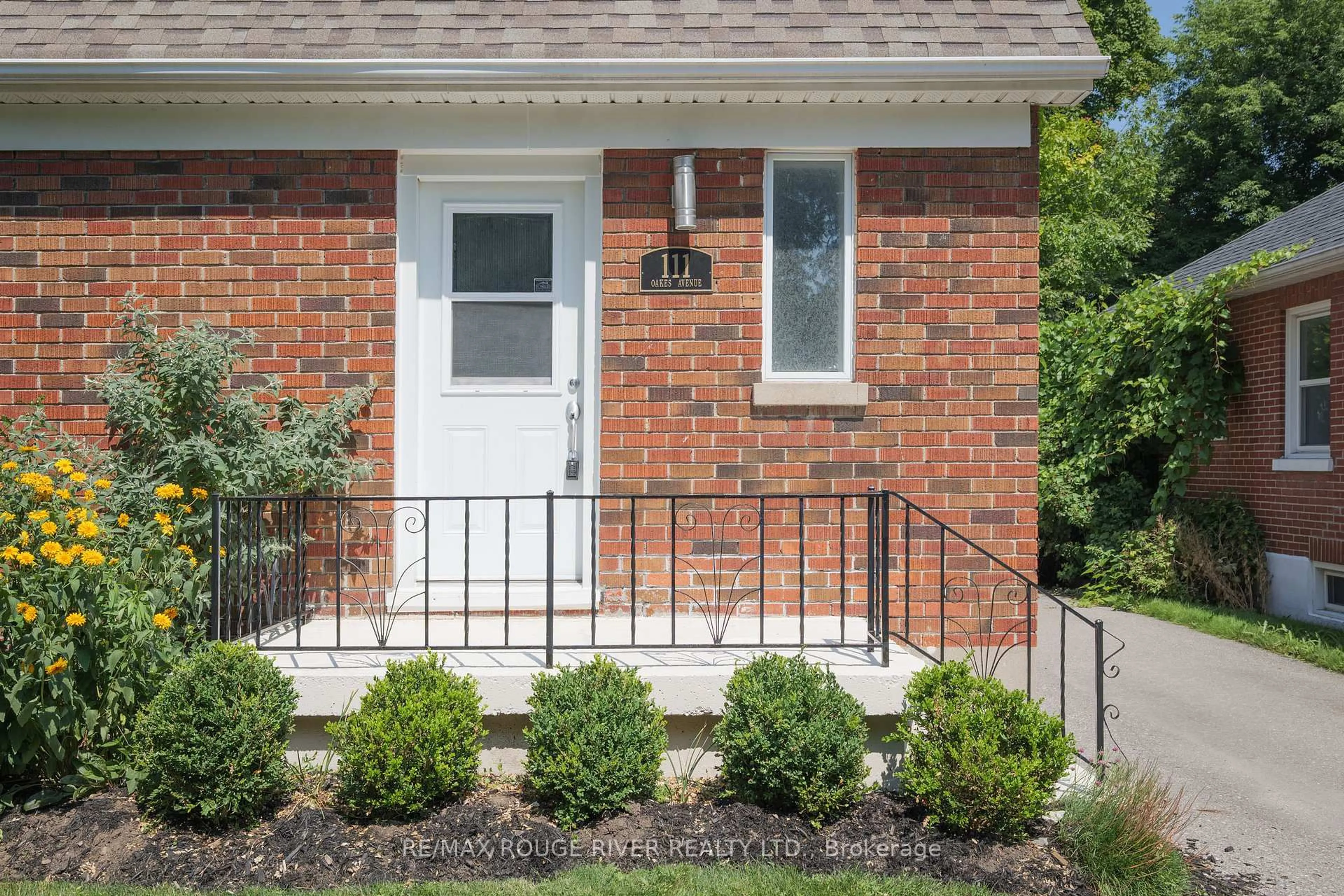 Home with brick exterior material, street for 111 Oakes Ave, Oshawa Ontario L1G 6C5