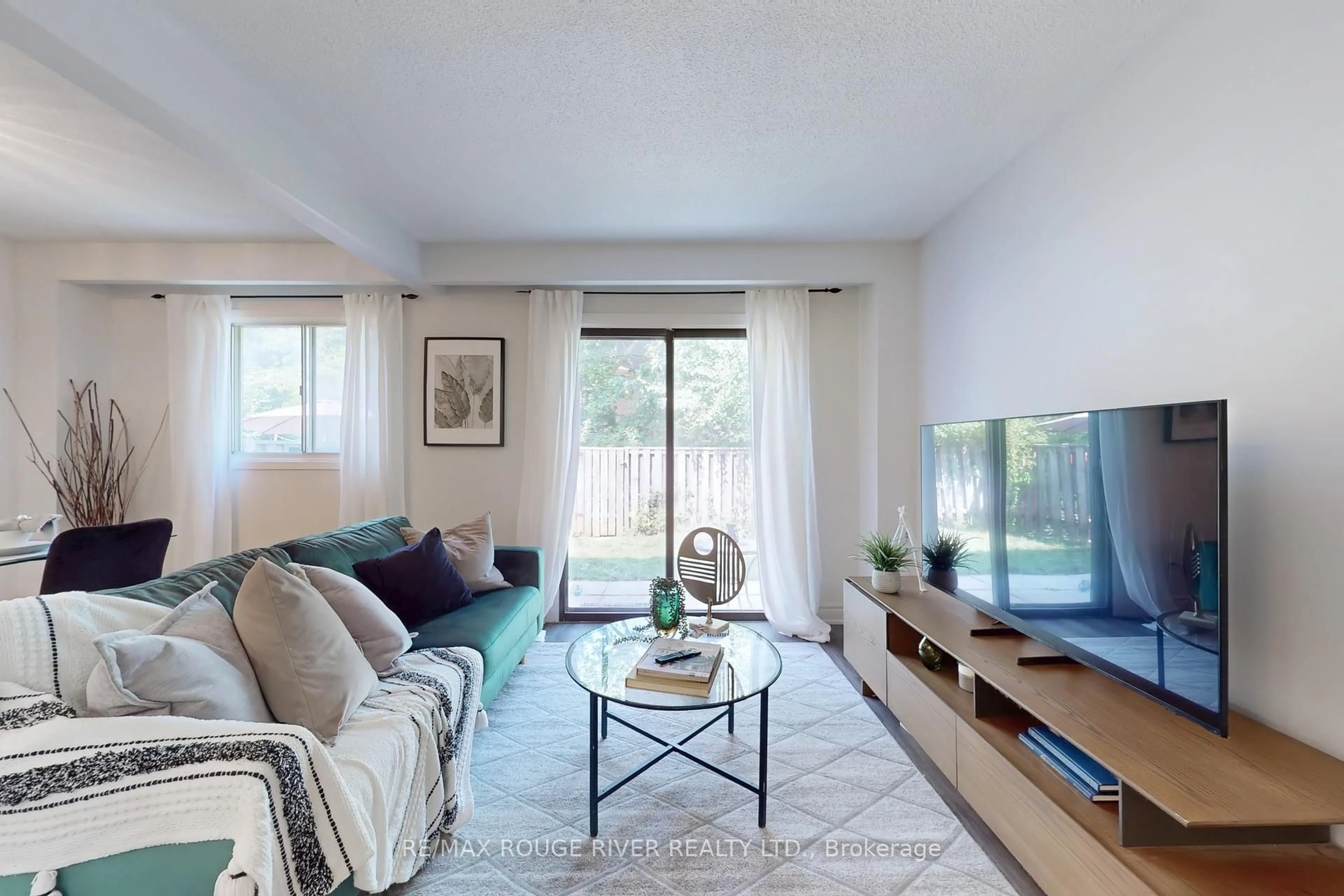 Living room with furniture, unknown for 34 Dundalk Dr #24, Toronto Ontario M1P 4W3