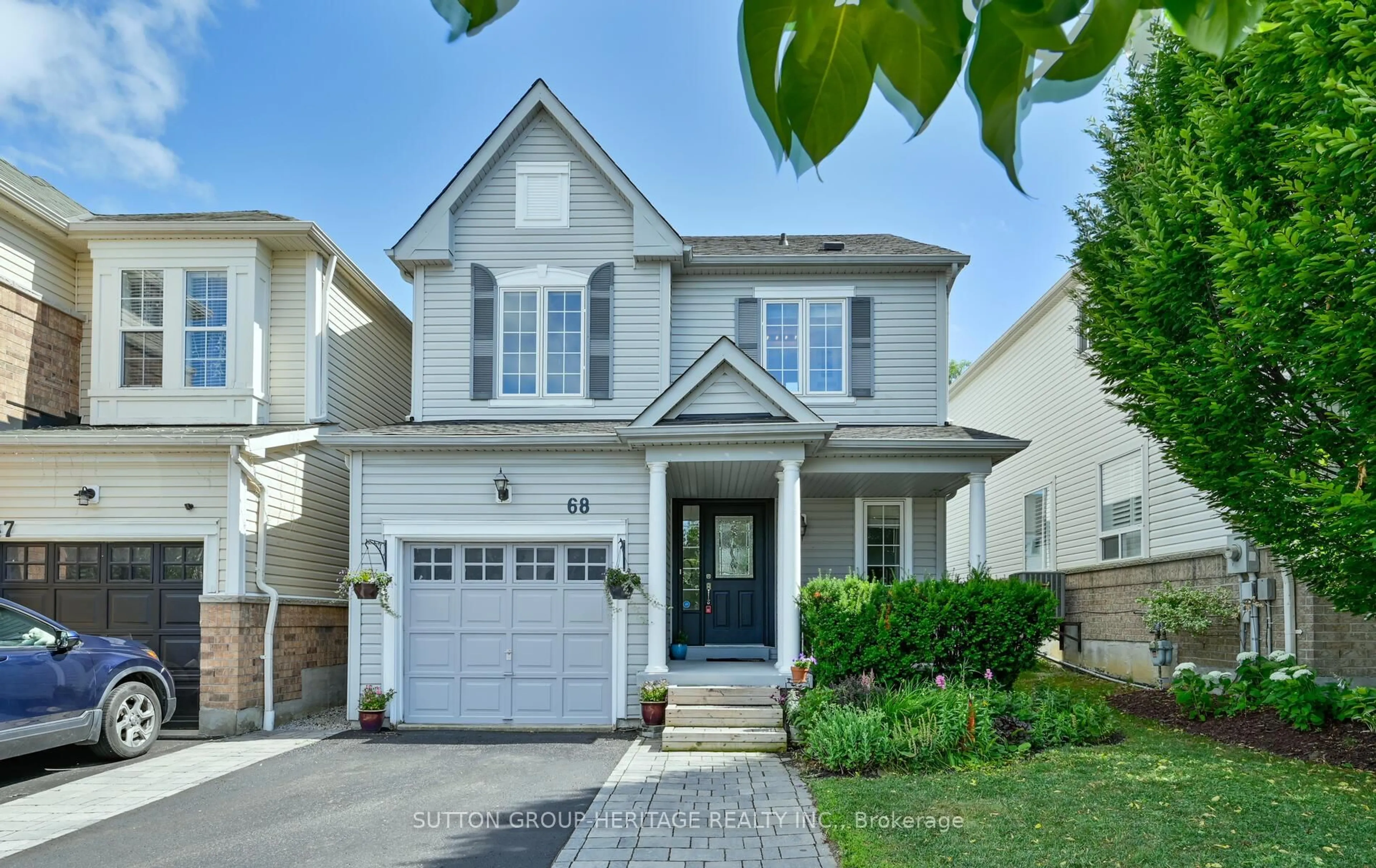 Home with vinyl exterior material, street for 68 Teardrop Cres, Whitby Ontario L1M 2N8