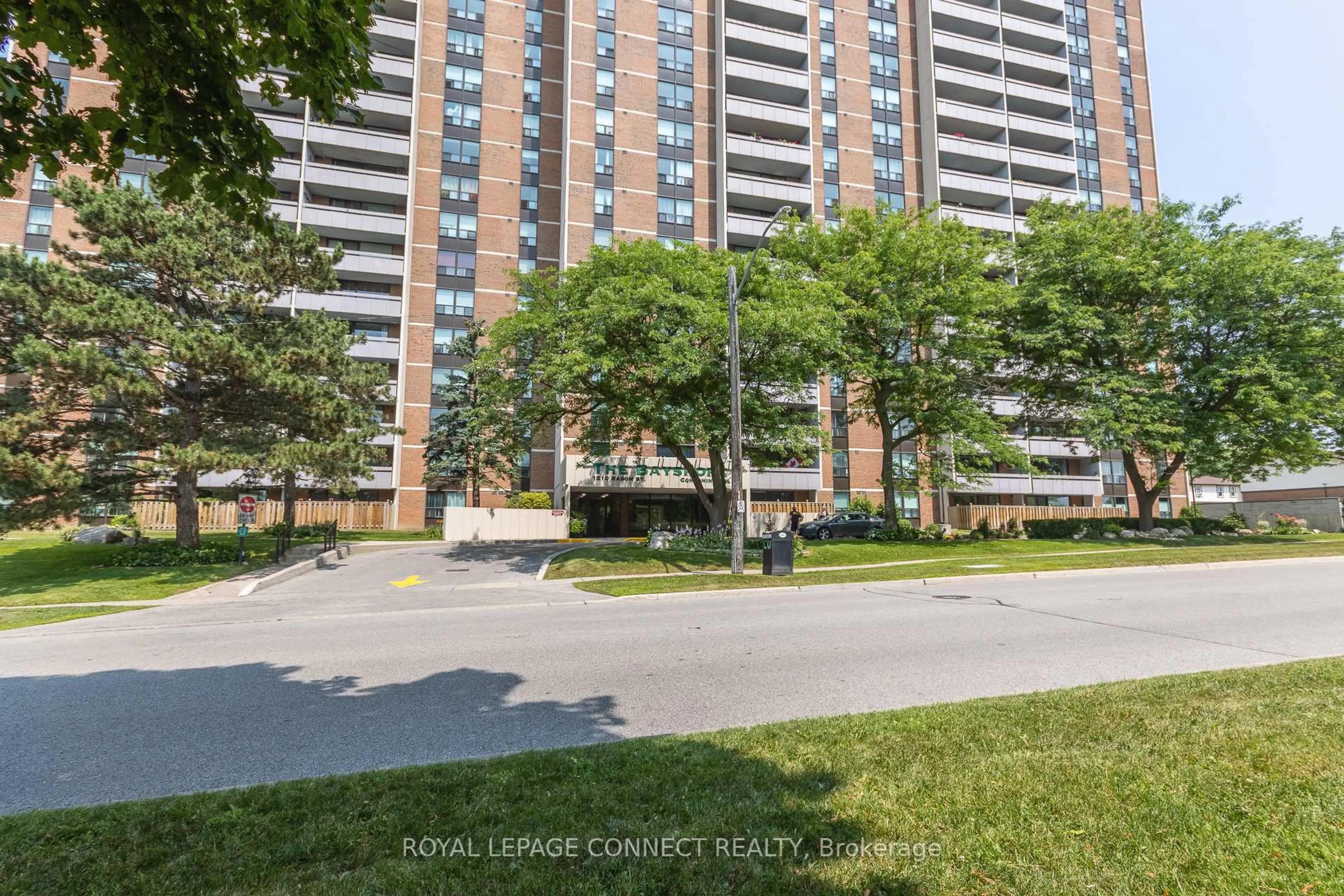 A pic from outside/outdoor area/front of a property/back of a property/a pic from drone, street for 1210 Radom St #404, Pickering Ontario L1W 2Z3