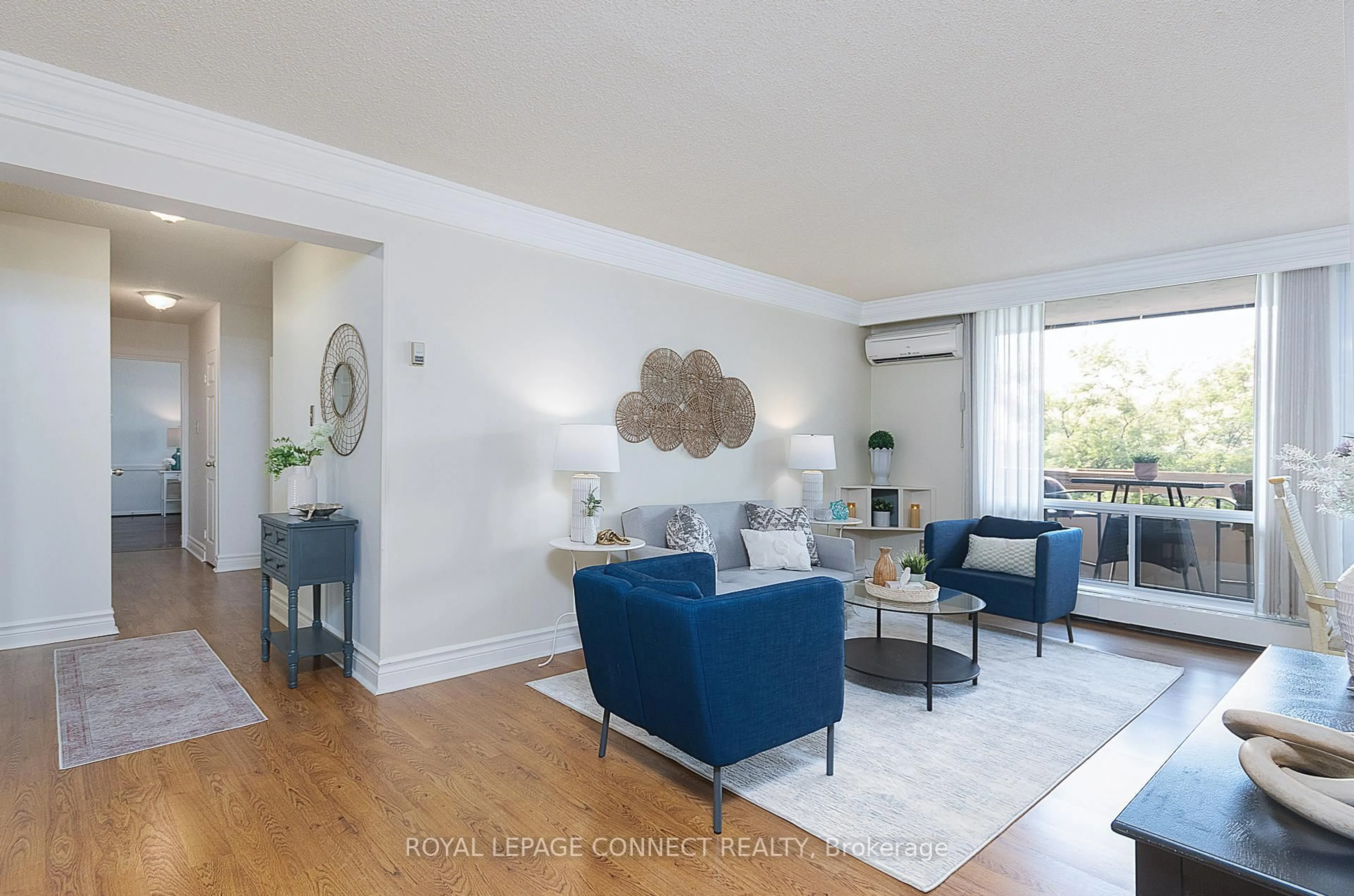 Living room with furniture, wood/laminate floor for 1210 Radom St #404, Pickering Ontario L1W 2Z3