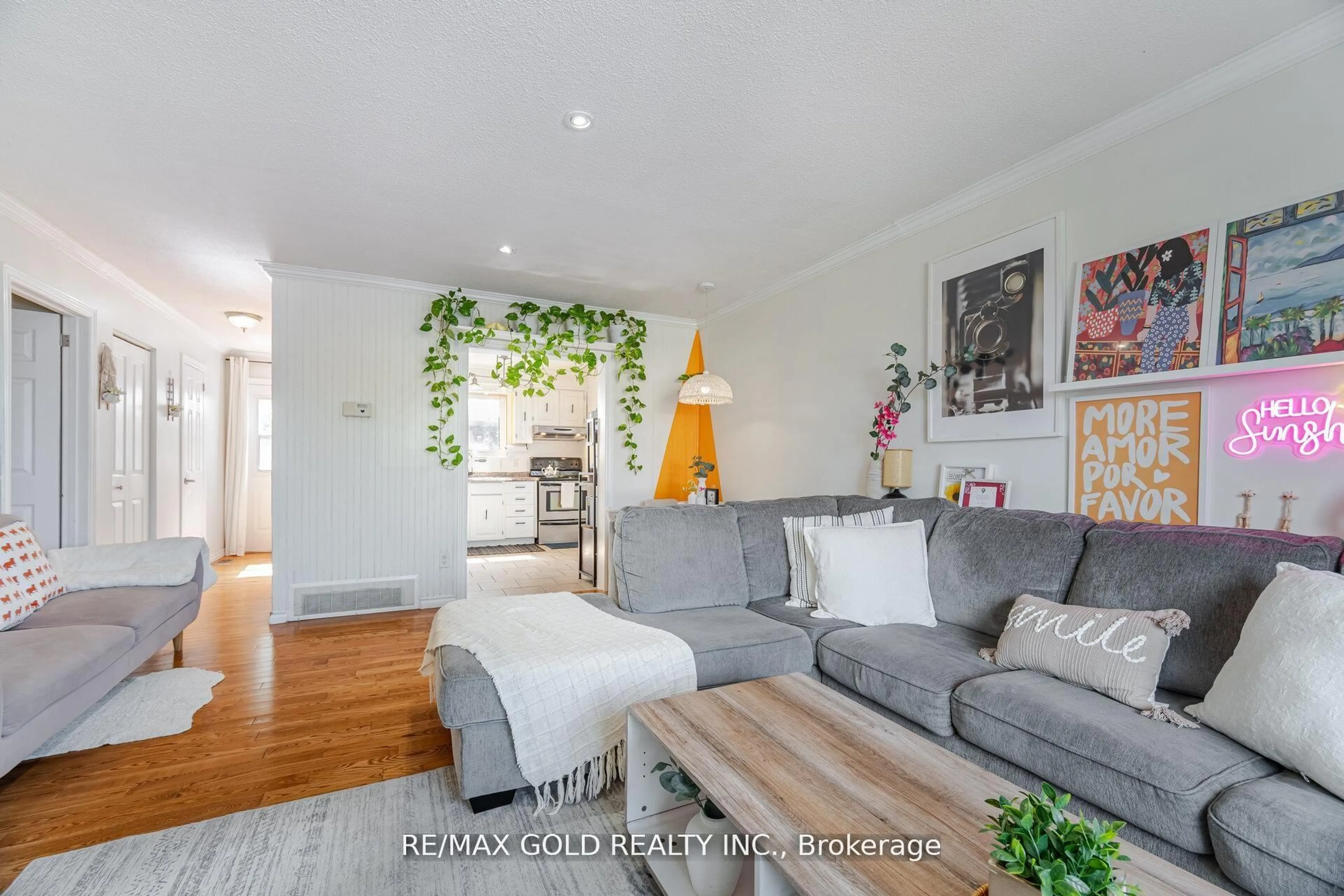 Living room with furniture, wood/laminate floor for 232 Durham St, Oshawa Ontario L1J 5R3