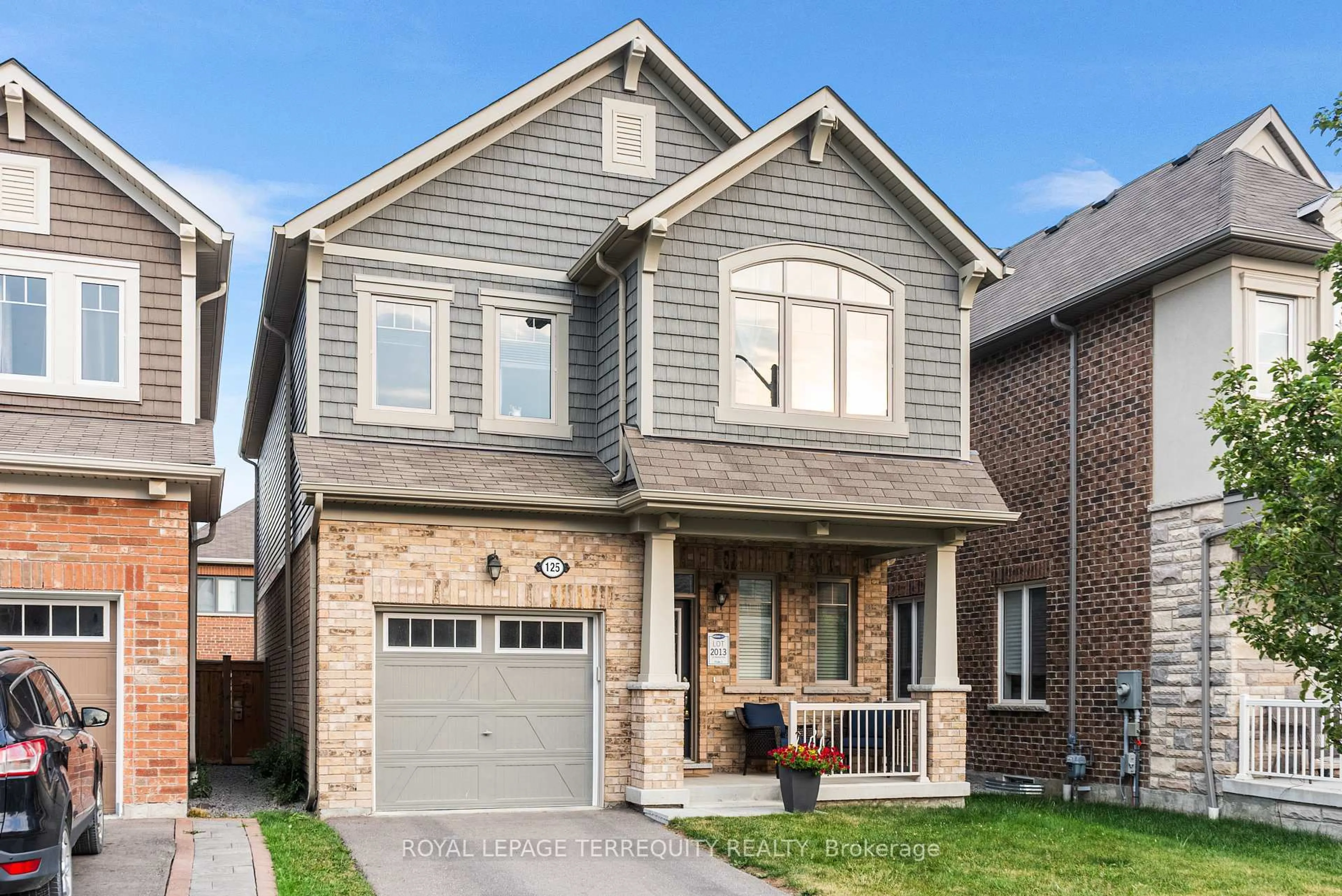 Home with brick exterior material, street for 125 Westfield Dr, Whitby Ontario L1P 0G1