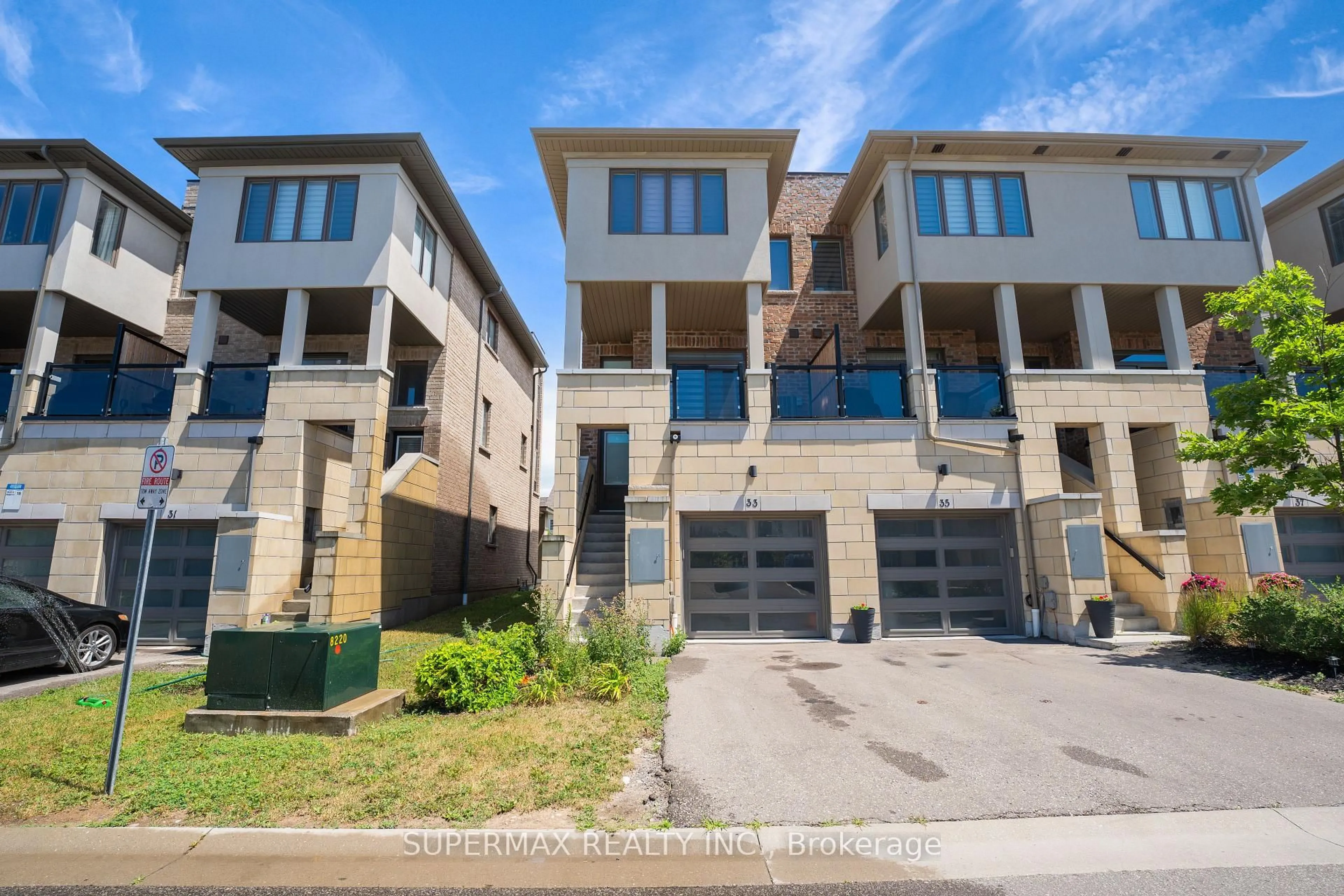A pic from outside/outdoor area/front of a property/back of a property/a pic from drone, street for 33 Donald Fleming Way #65, Whitby Ontario L1R 0N8