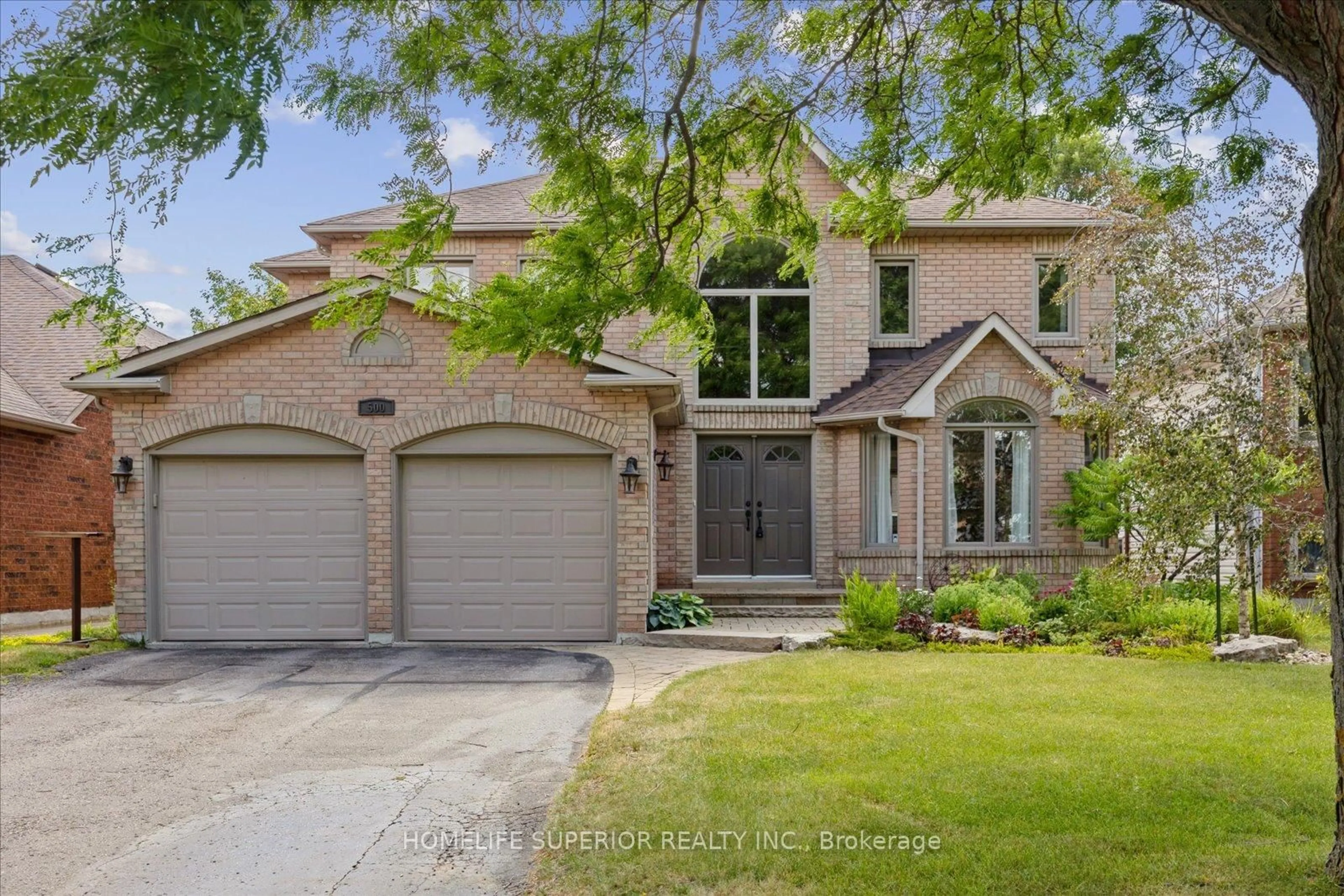 Home with brick exterior material, street for 500 Sandalwood Crt, Oshawa Ontario L1G 7X9