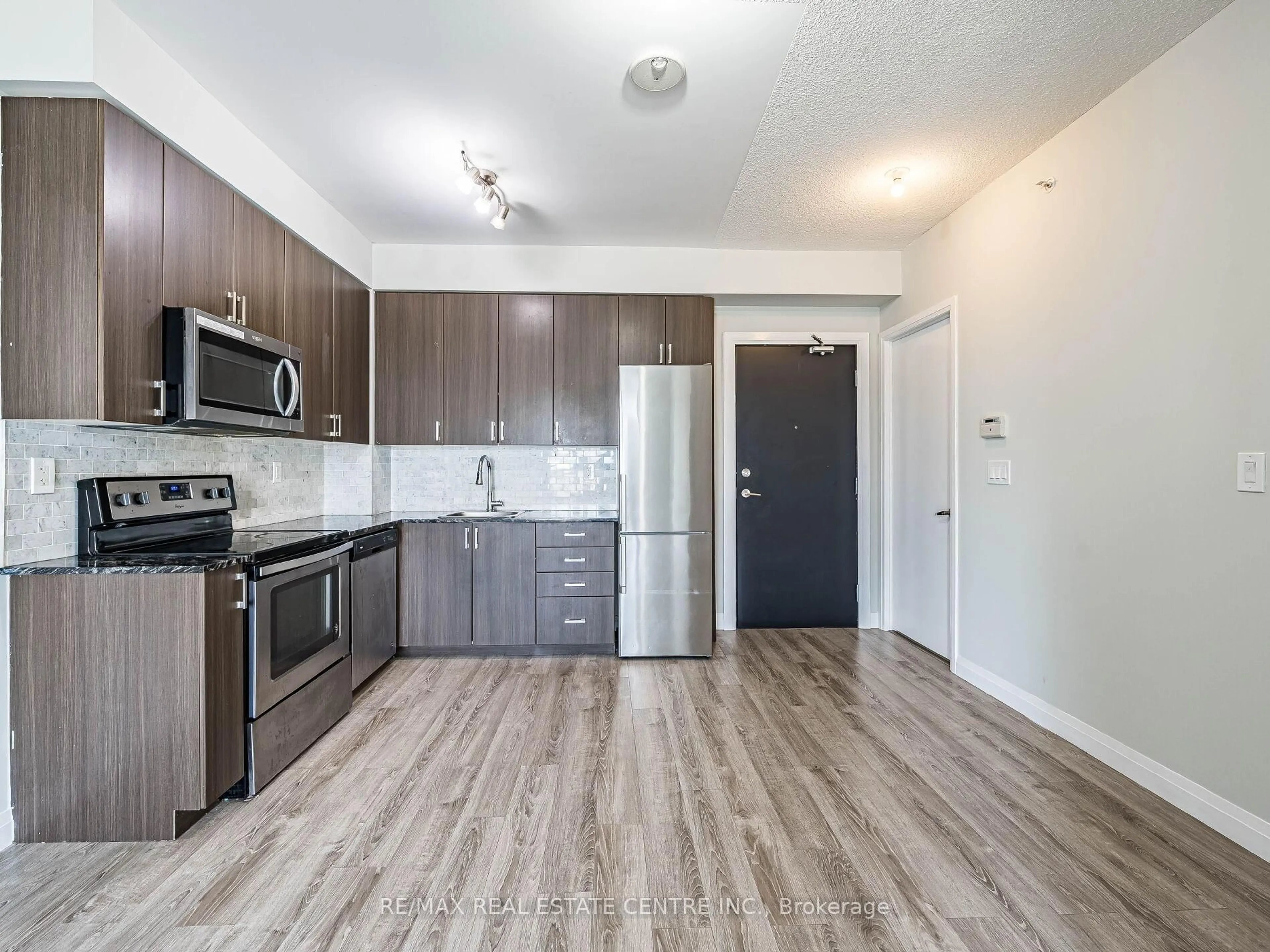 Standard kitchen, wood/laminate floor for 22 East Haven Dr #306, Toronto Ontario M1N 0B4