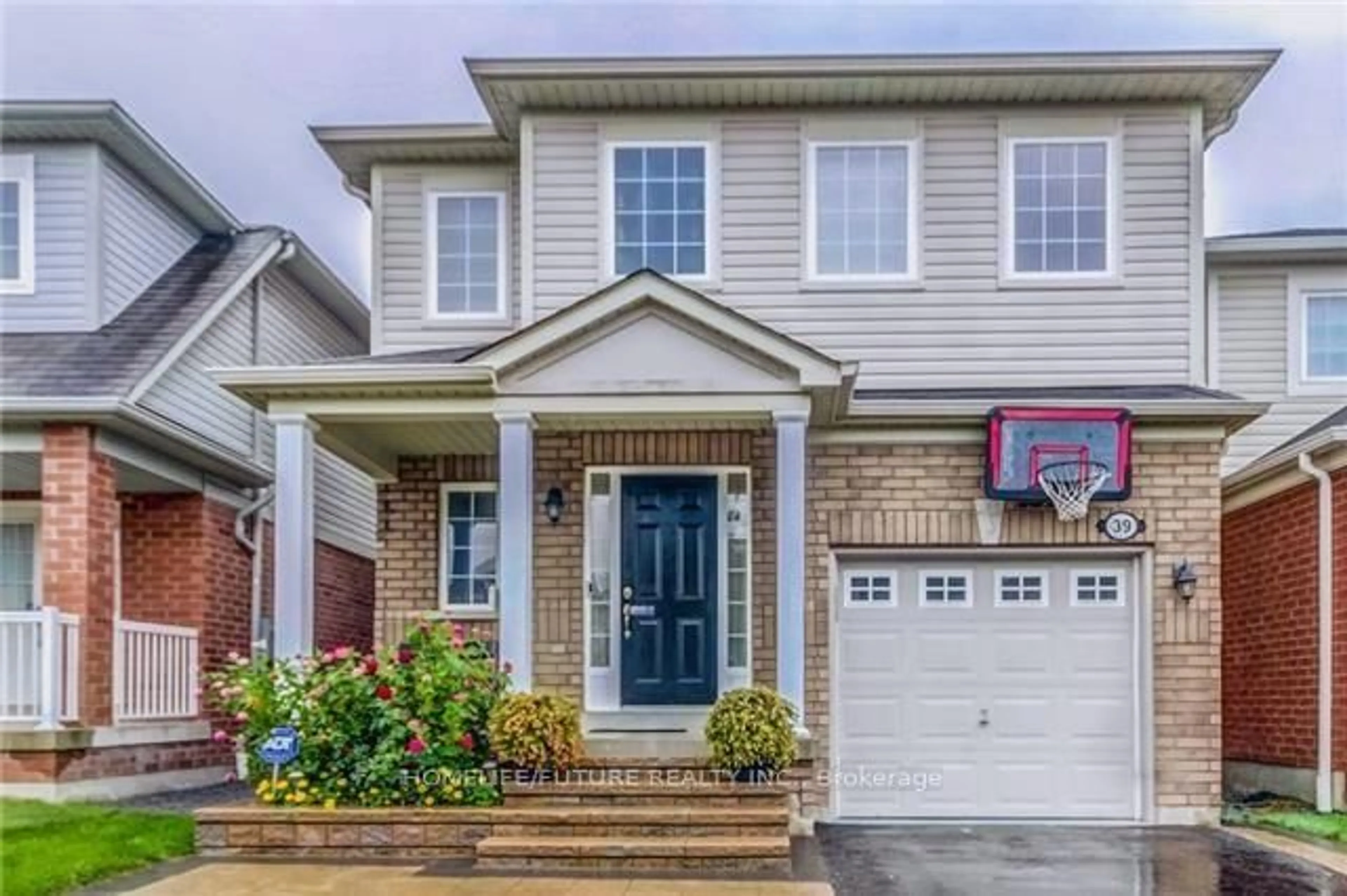 Home with brick exterior material, street for 39 Harkness Dr, Whitby Ontario L1R 0C5