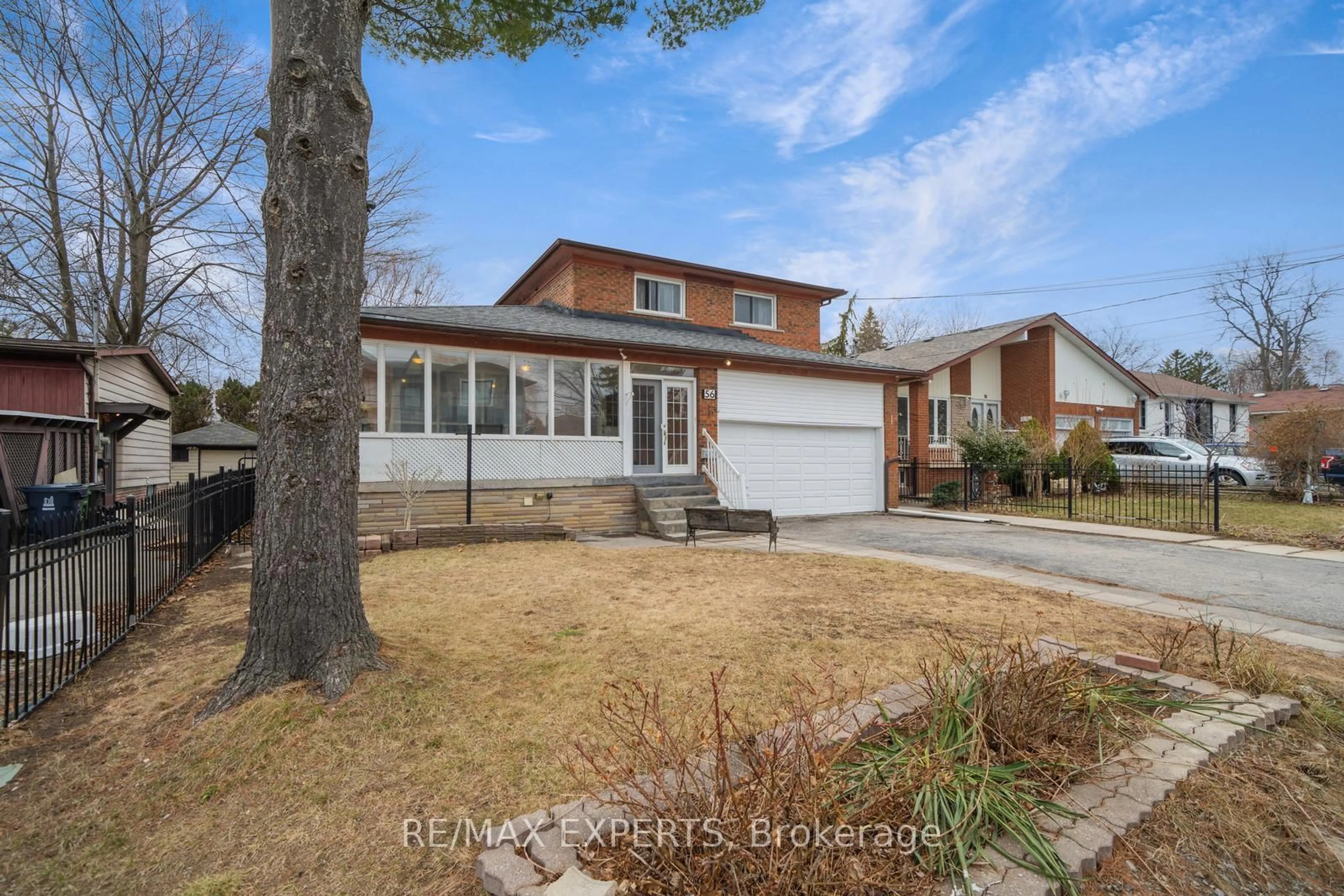 Home with brick exterior material, street for 56 Homestead Rd, Toronto Ontario M1E 3R9