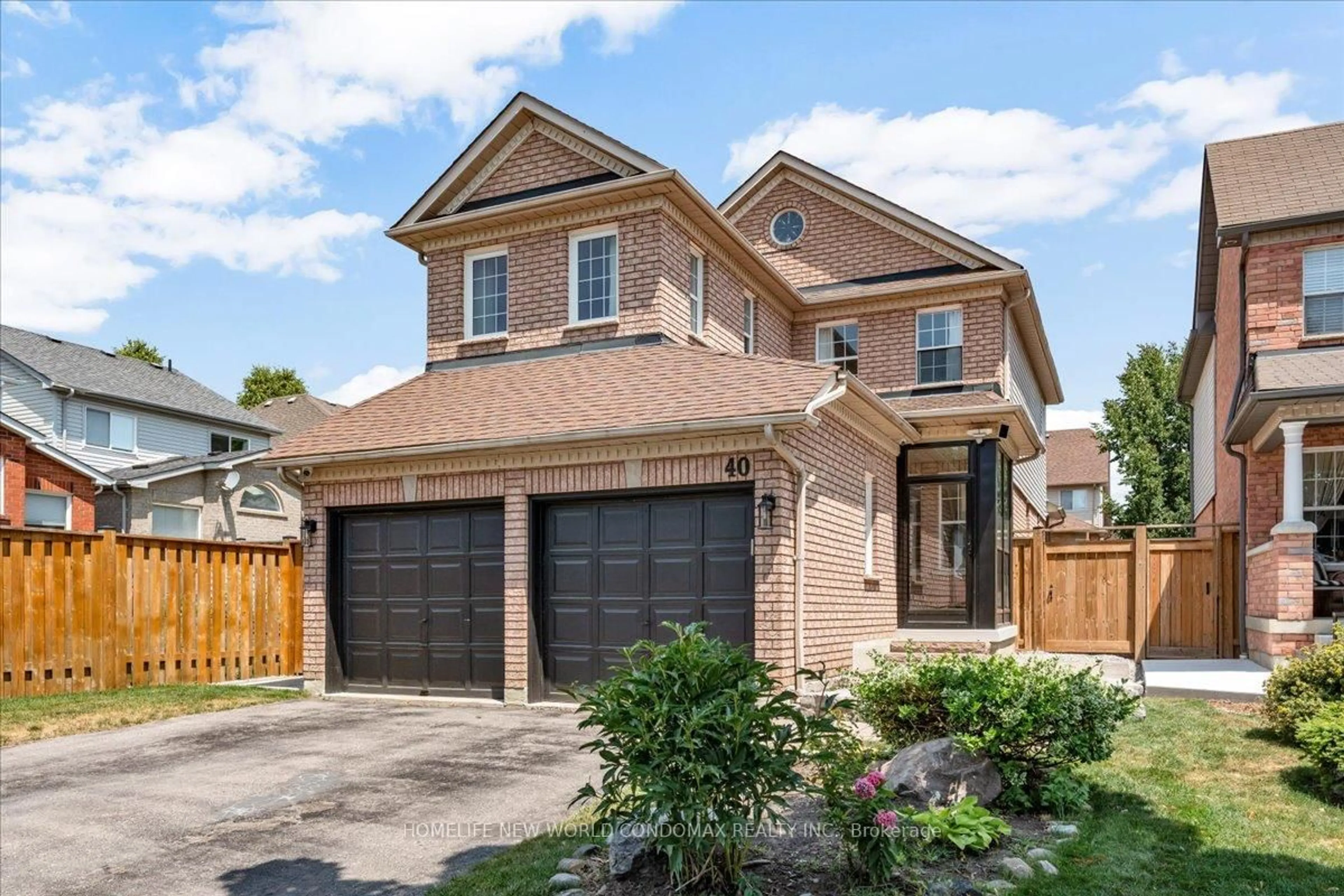 Home with brick exterior material, street for 40 Tidewater Cres, Whitby Ontario L1P 1M2