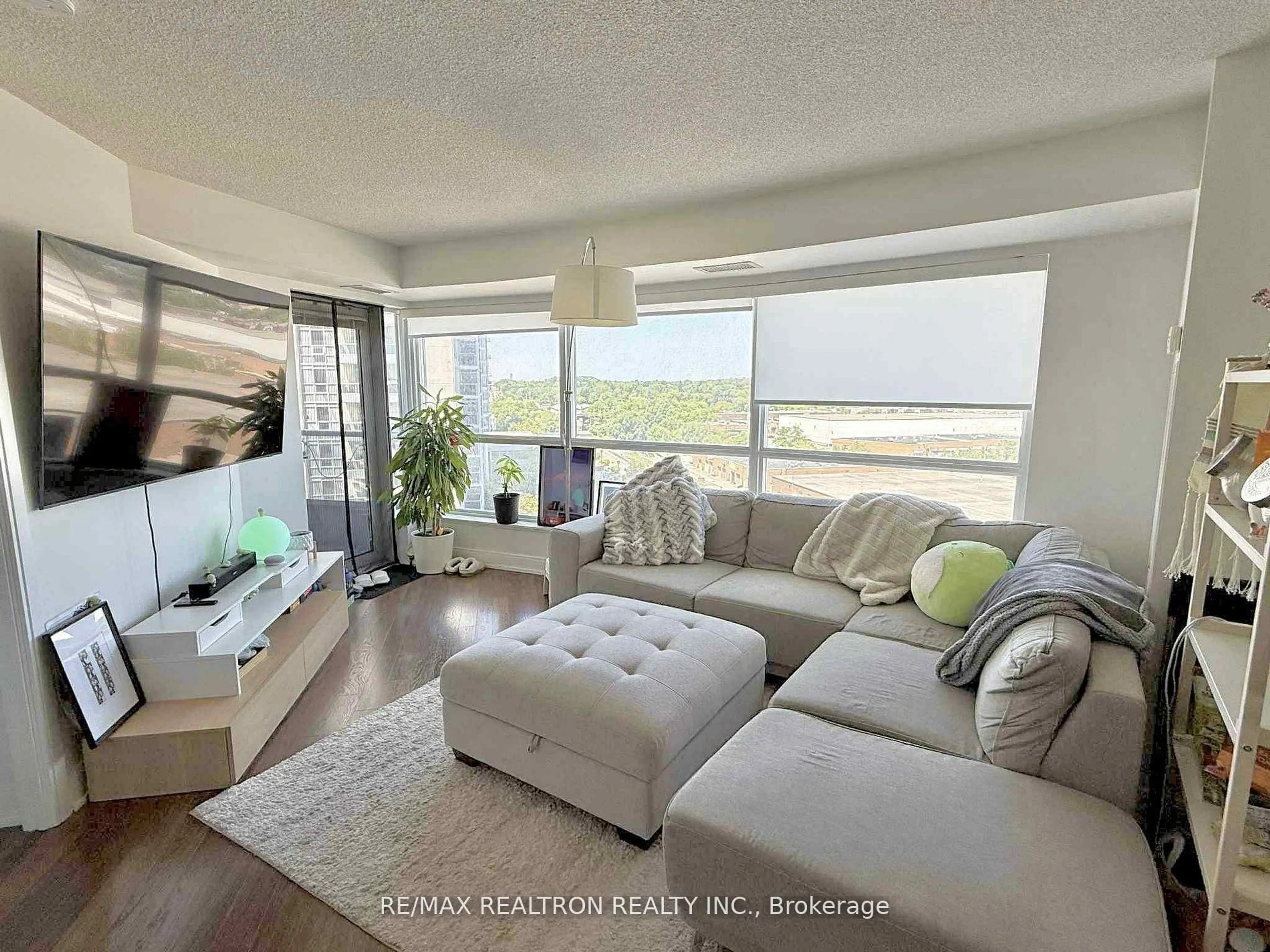Living room with furniture, unknown for 135 Village Green Sq #824, Toronto Ontario M1S 0G4