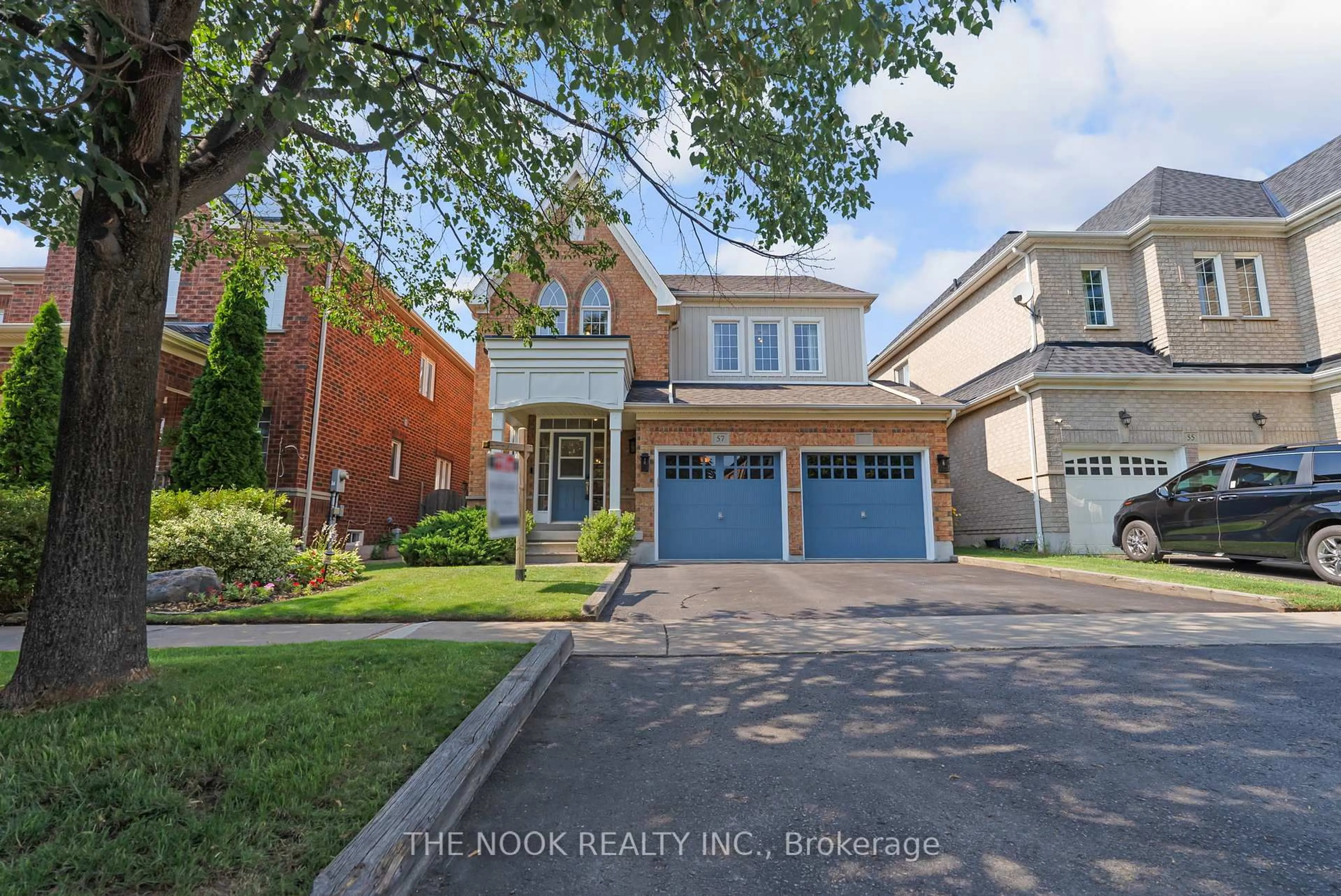 Home with brick exterior material, street for 57 DUNWELL Cres, Ajax Ontario L1T 0A7