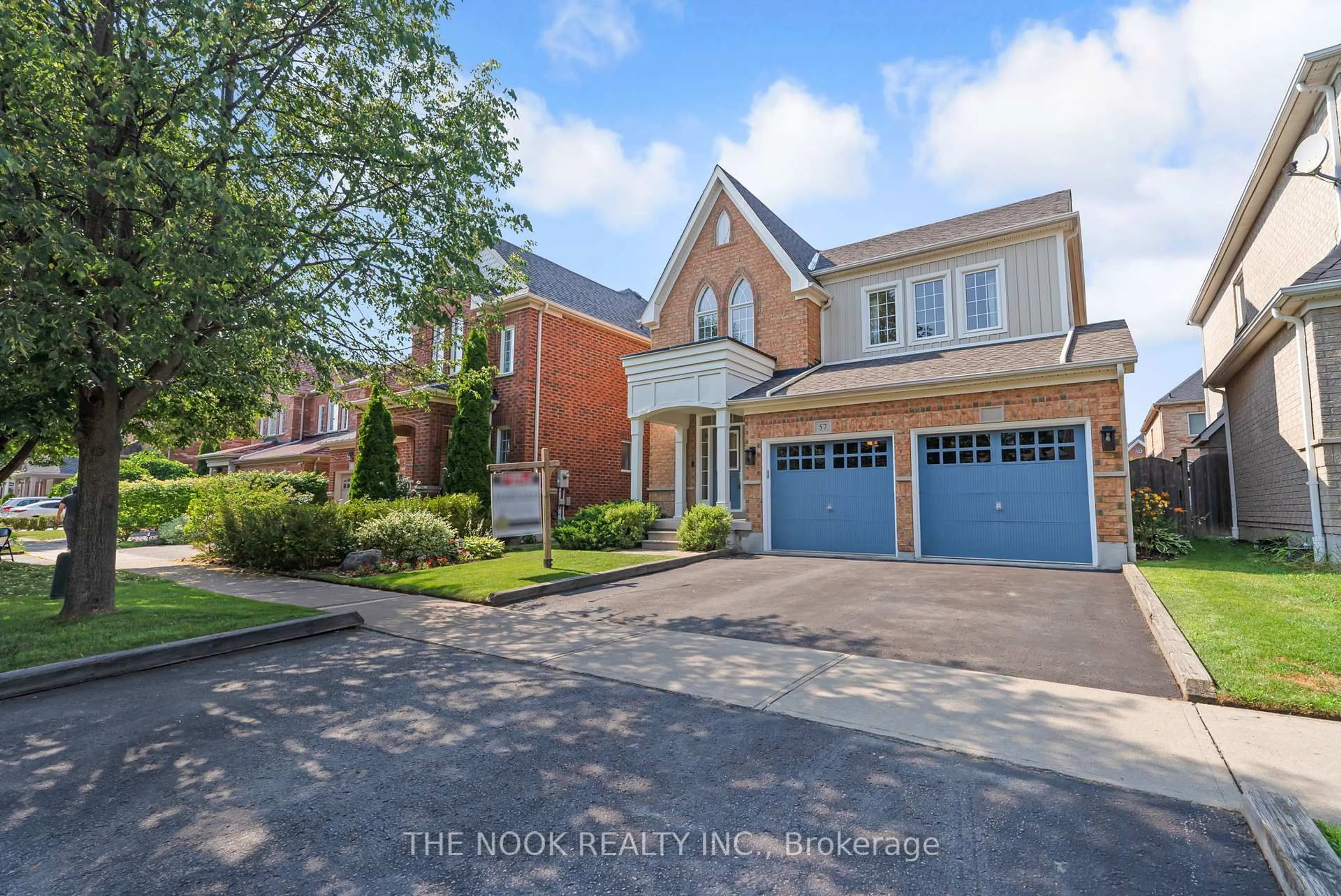 Home with brick exterior material, street for 57 DUNWELL Cres, Ajax Ontario L1T 0A7