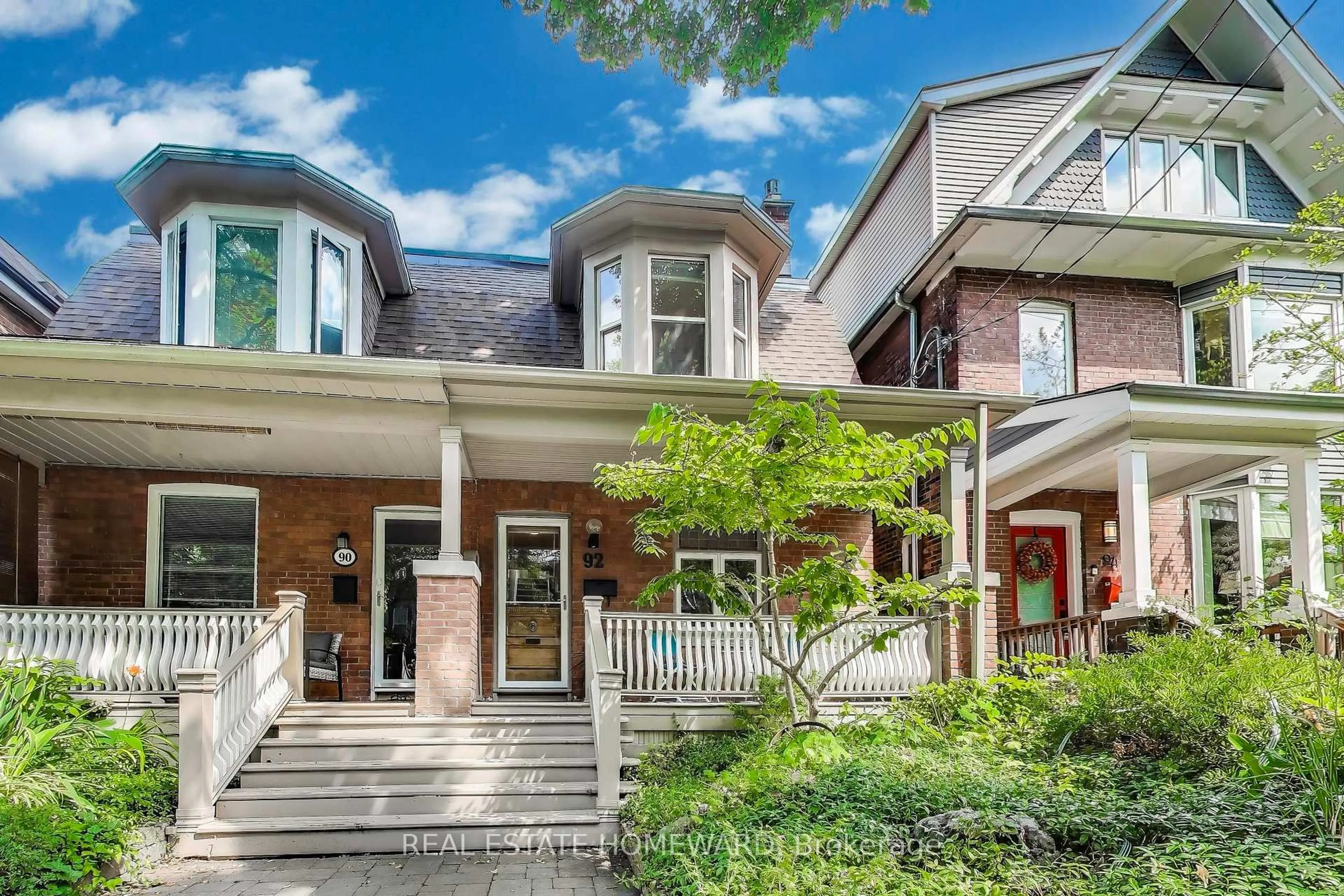 Home with brick exterior material, street for 92 Dearbourne Ave, Toronto Ontario M4K 1M7