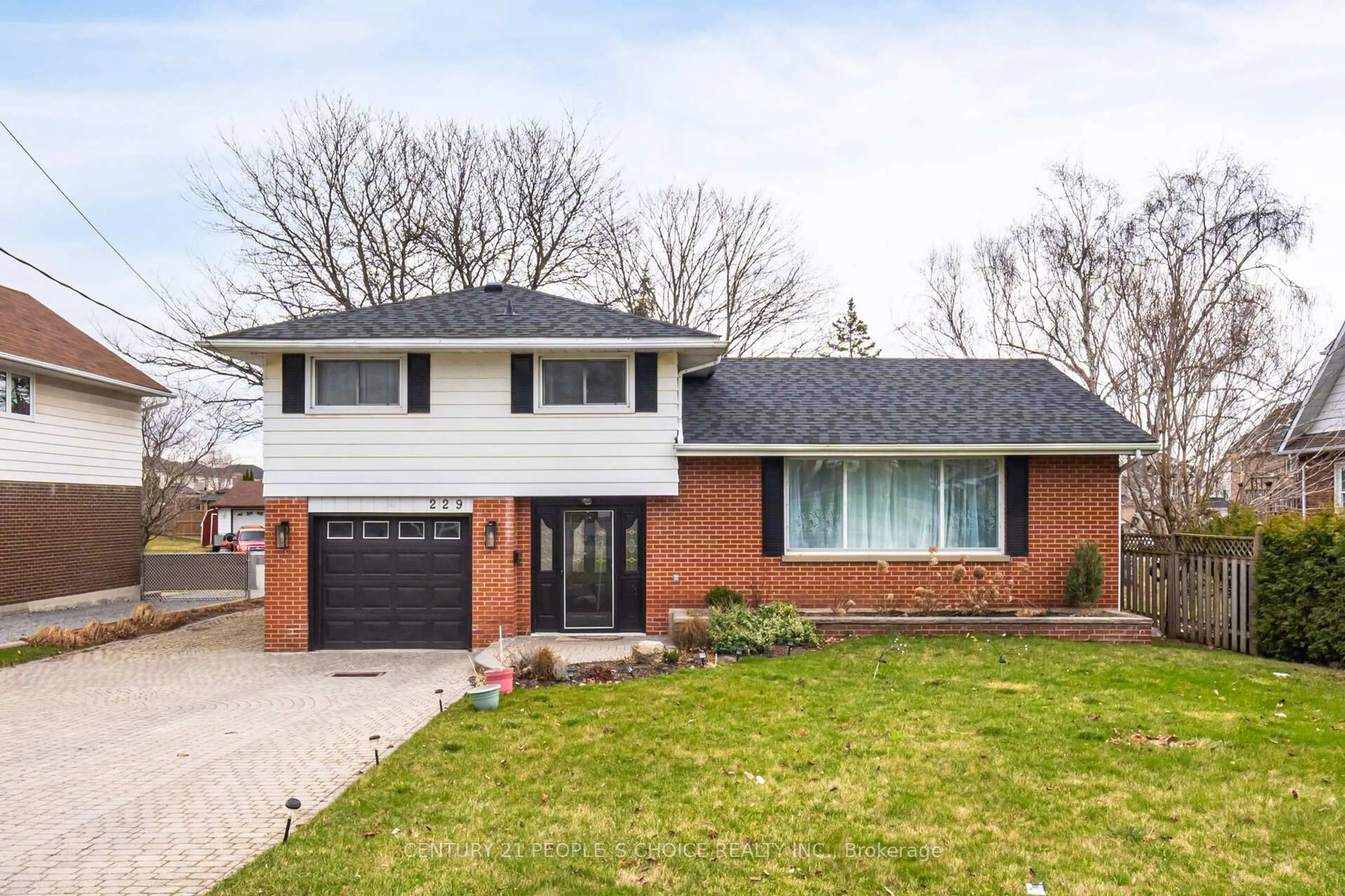 Home with brick exterior material, street for 229 Liberty St, Clarington Ontario L1C 2M6