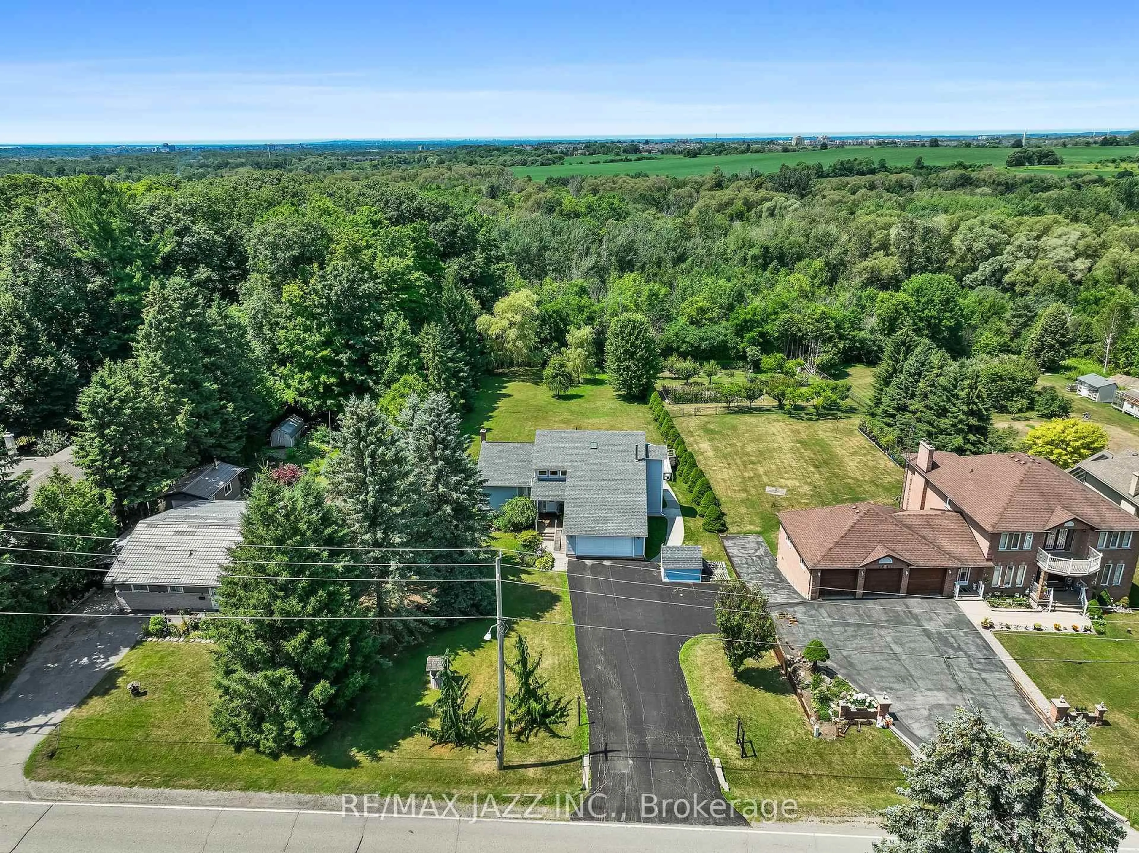 A pic from outside/outdoor area/front of a property/back of a property/a pic from drone, water/lake/river/ocean view for 4534 Trulls Rd, Clarington Ontario L0B 1J0