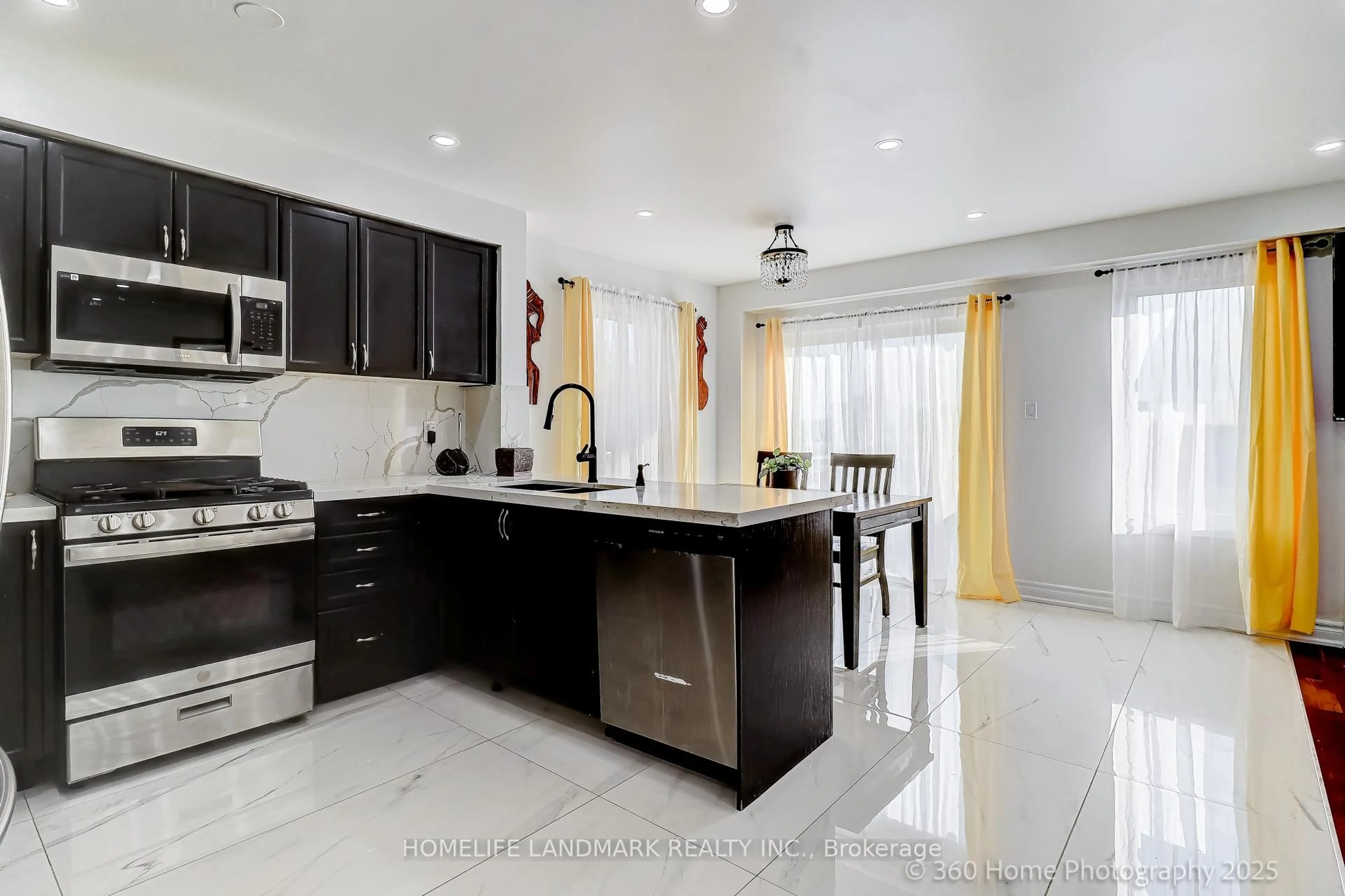 Open concept kitchen, ceramic/tile floor for 105 Warnford Circ, Ajax Ontario L1T 0J3