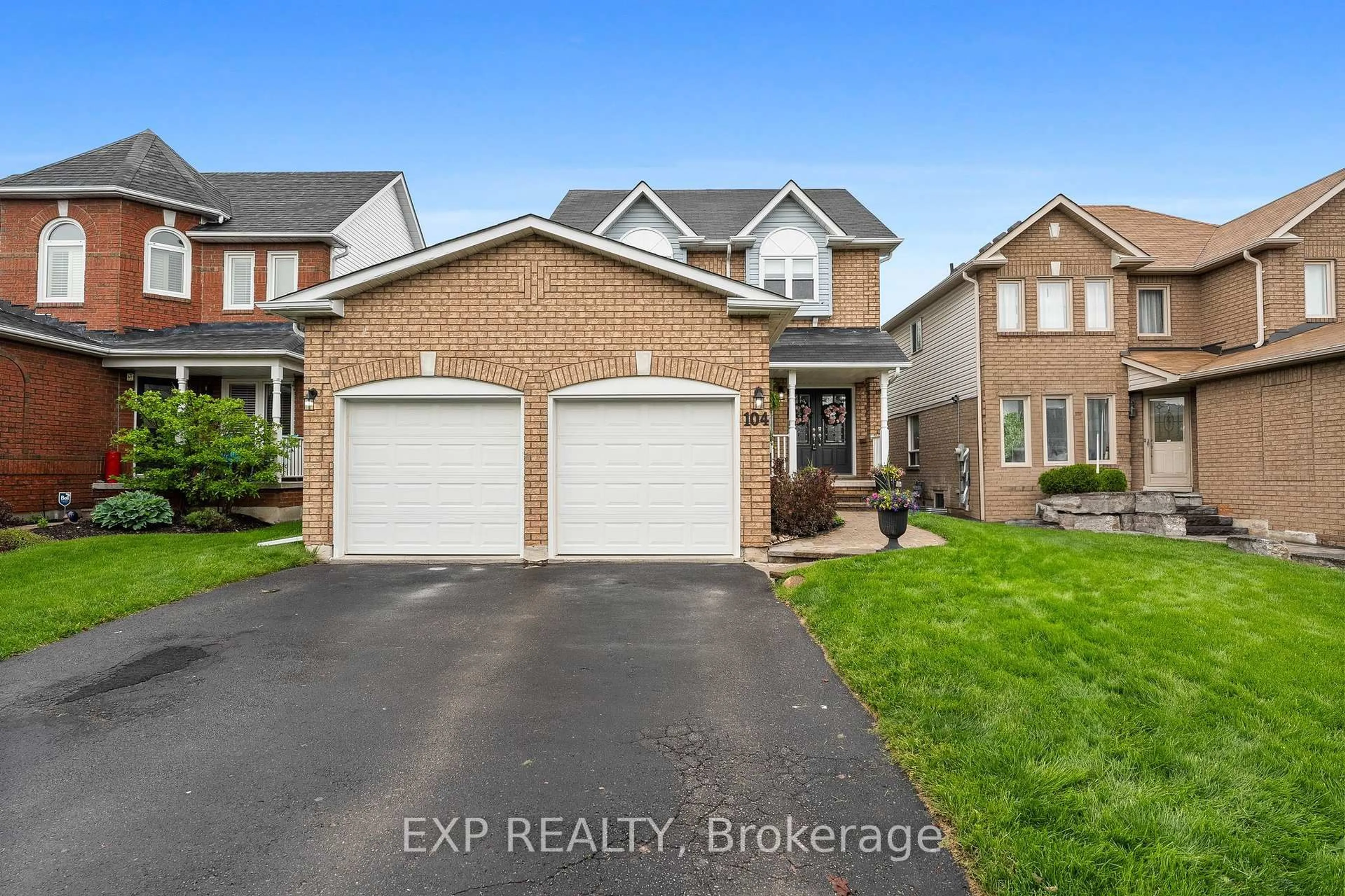 Home with brick exterior material, street for 104 Apple Blossom Blvd, Clarington Ontario L1C 4T7