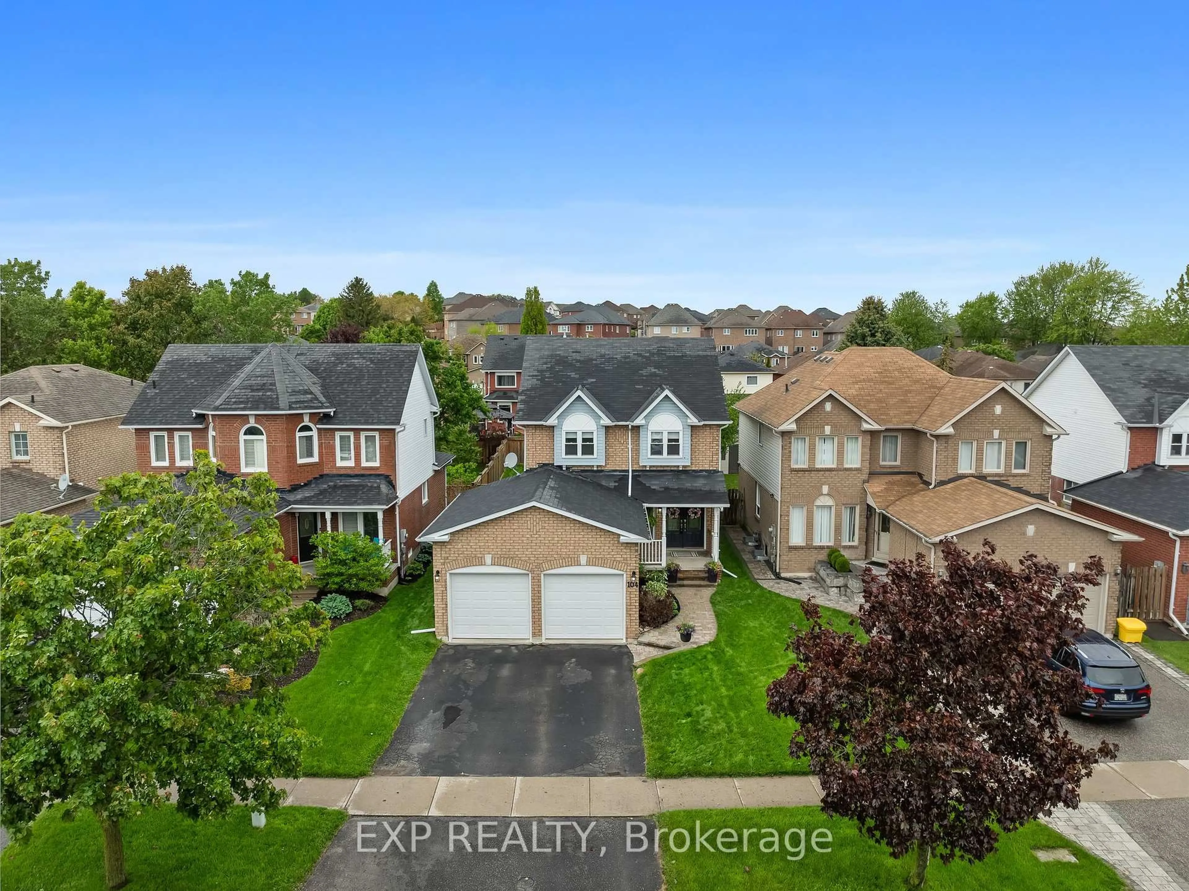 A pic from outside/outdoor area/front of a property/back of a property/a pic from drone, street for 104 Apple Blossom Blvd, Clarington Ontario L1C 4T7