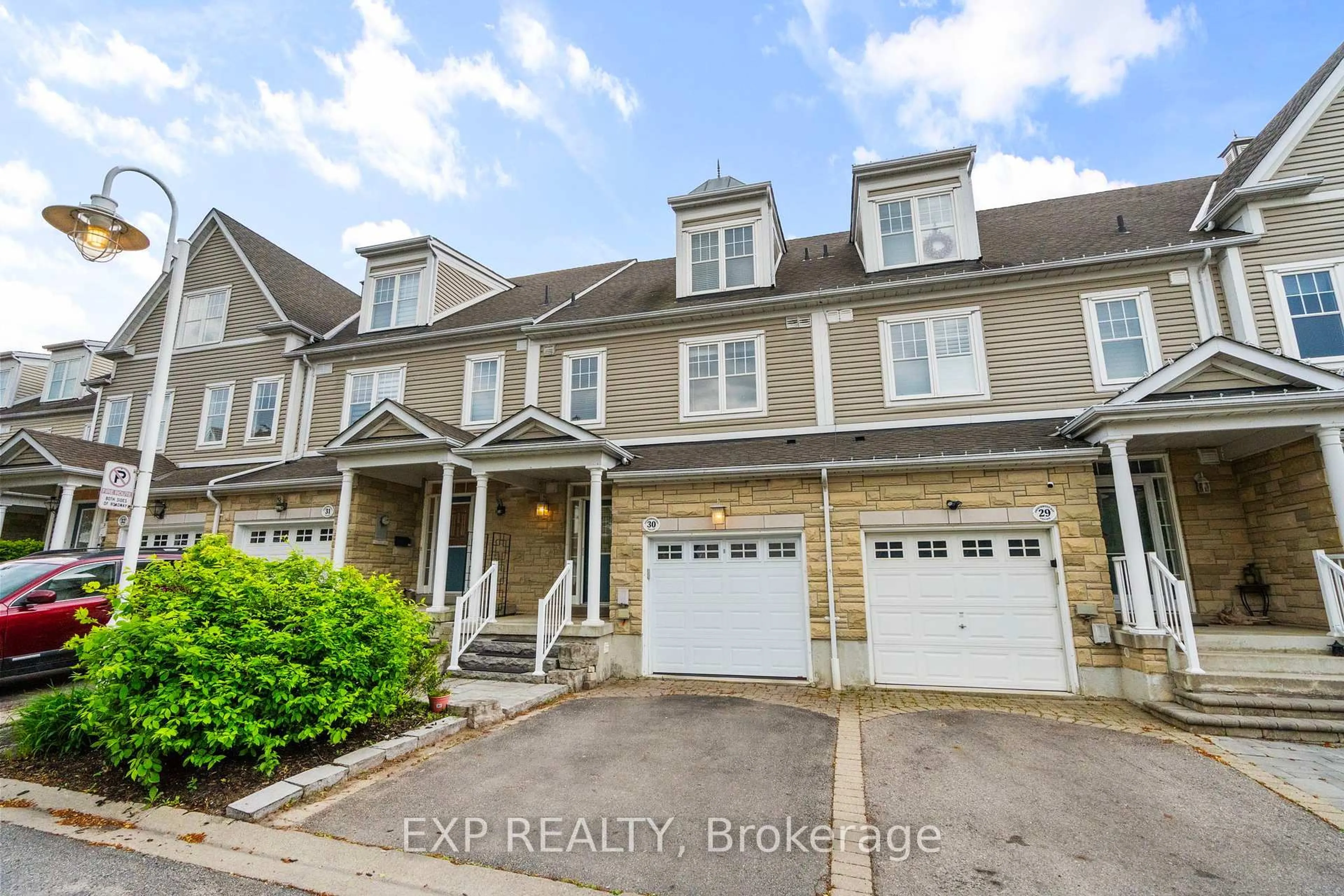 A pic from outside/outdoor area/front of a property/back of a property/a pic from drone, street for 1295 Wharf St #30, Pickering Ontario L1W 1A2