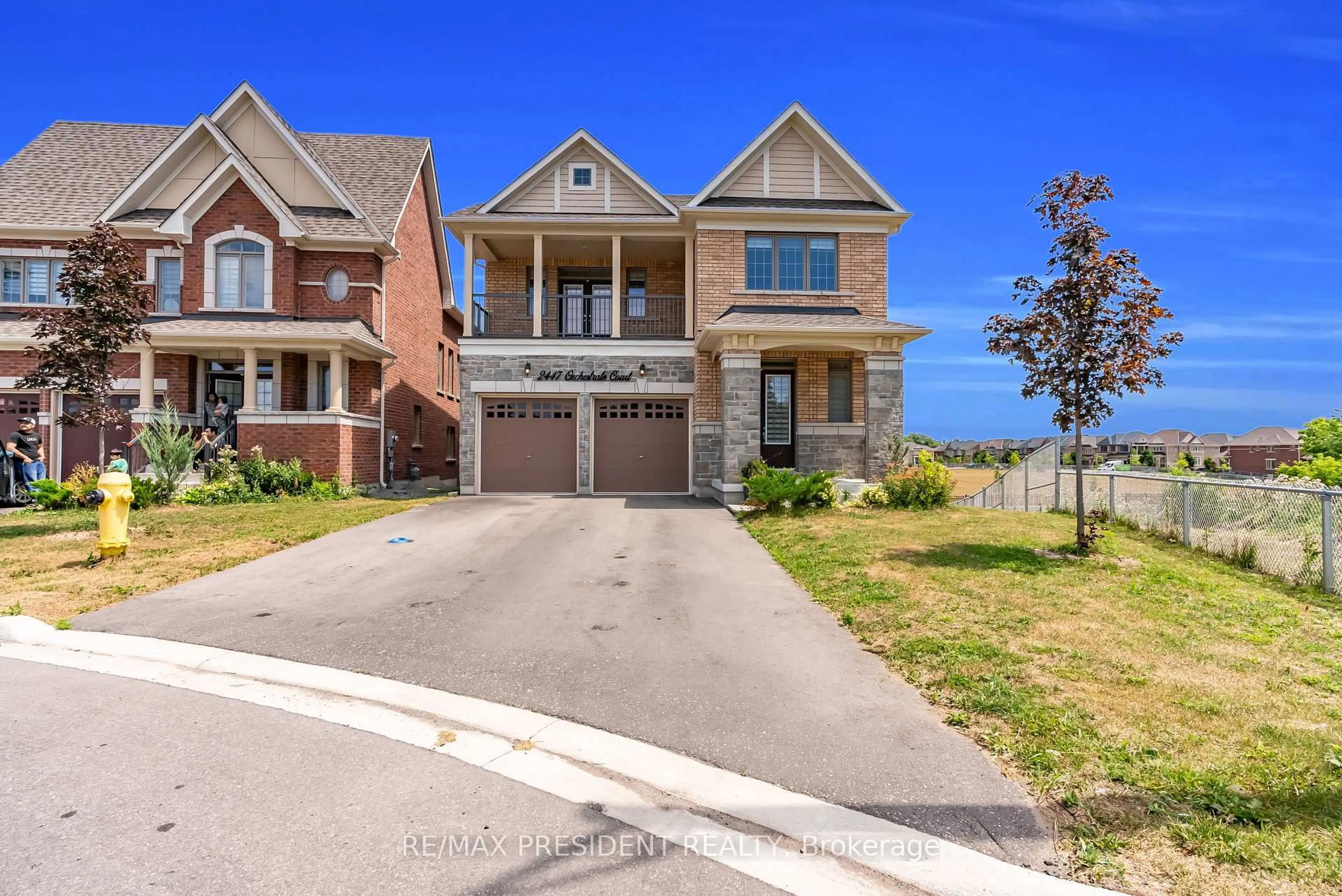 Home with brick exterior material, street for 2447 Orchestrate Crt, Oshawa Ontario L1L 0R3